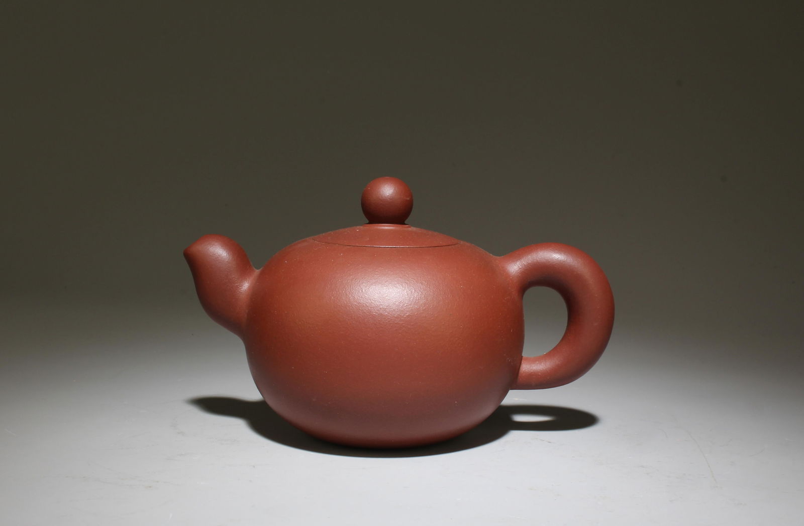 A Zisha Teapot: A Zisha Teapot. Dimensions: 6.25" x 3.5".