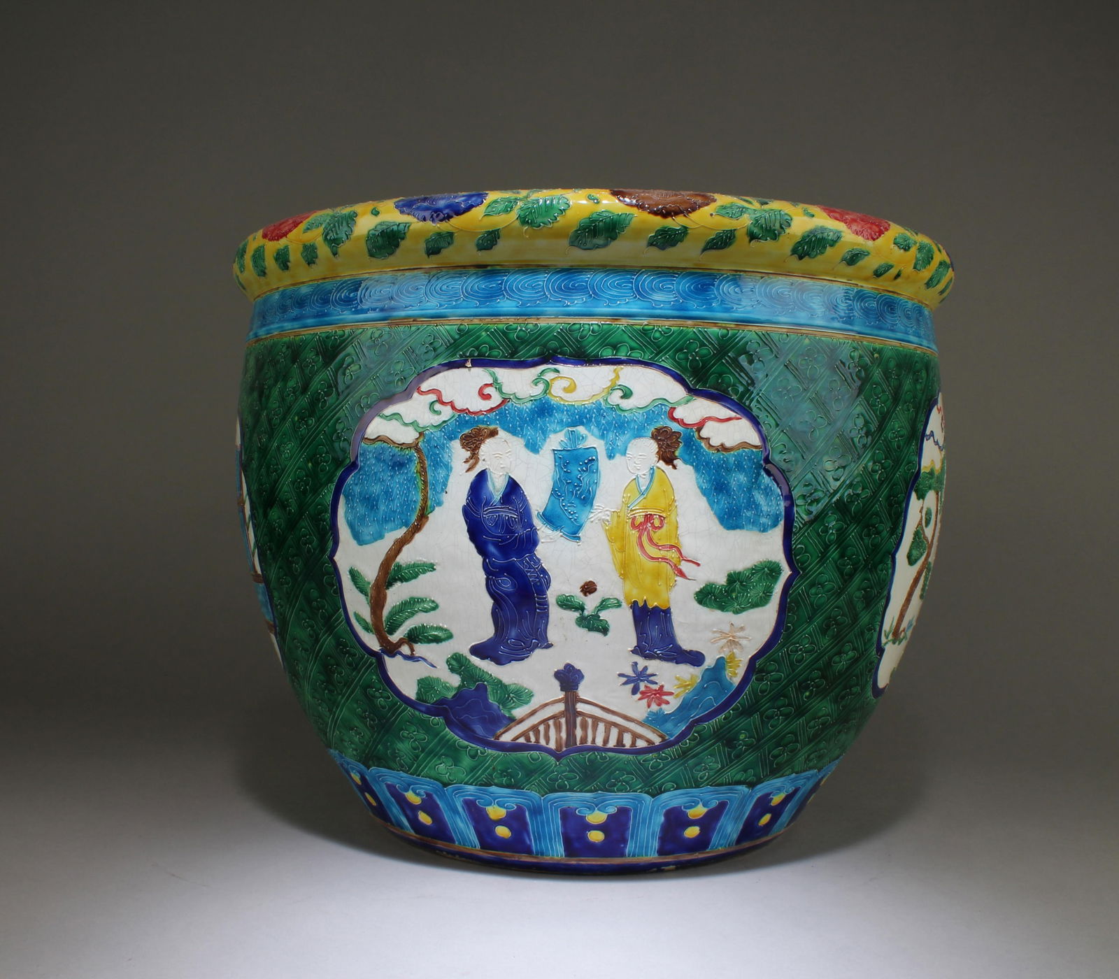 A Porcelain Tank: A Porcelain Tank. 'YongLe' mar on body. Diameter: 16" Height: 12.5"