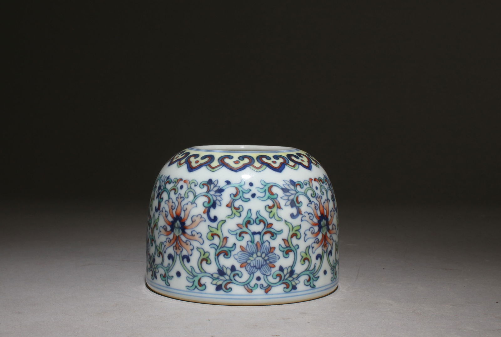 Chinese Doucai Porcelain Water Dropper: Chinese Doucai Porcelain Water Dropper,"QianLong" mark at base. Dimension: 2.6" x 3.5".