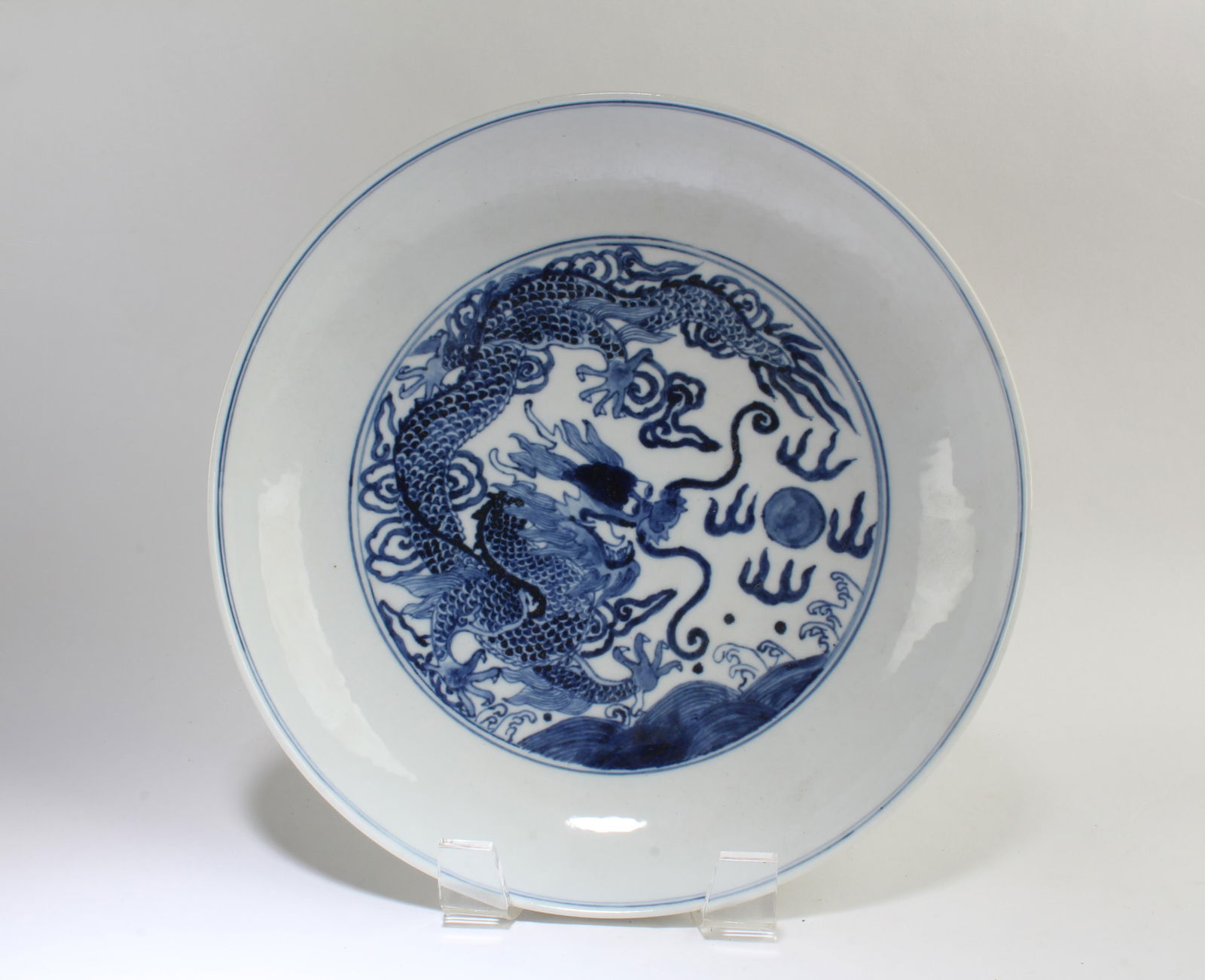 Chinese Porcelain Plate: Chinese Porcelain Plate. 'KangXi' mark at base. Diameter: 8.75"