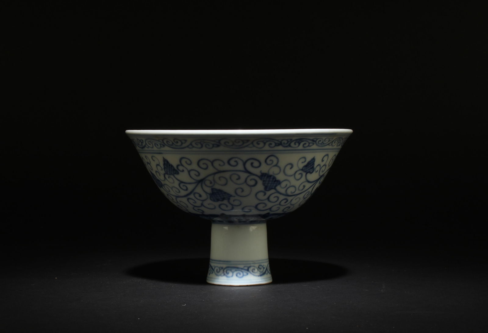 A Blue & White Stem Bowl: A Blue & White Stem Bowl. Dimensions: 6.75" x 4.2".