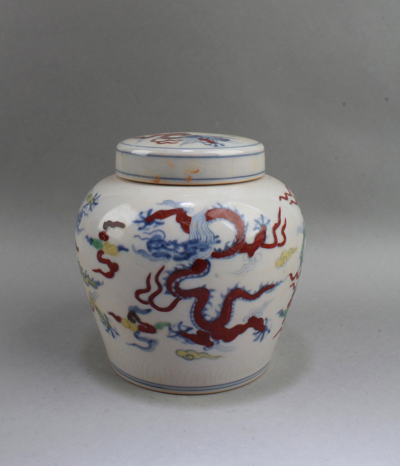 Chinese Porcelain Container: Chinese Porcelain Container with lid. A 'Tian' character is imprinted at the base. Height: 5.5"
