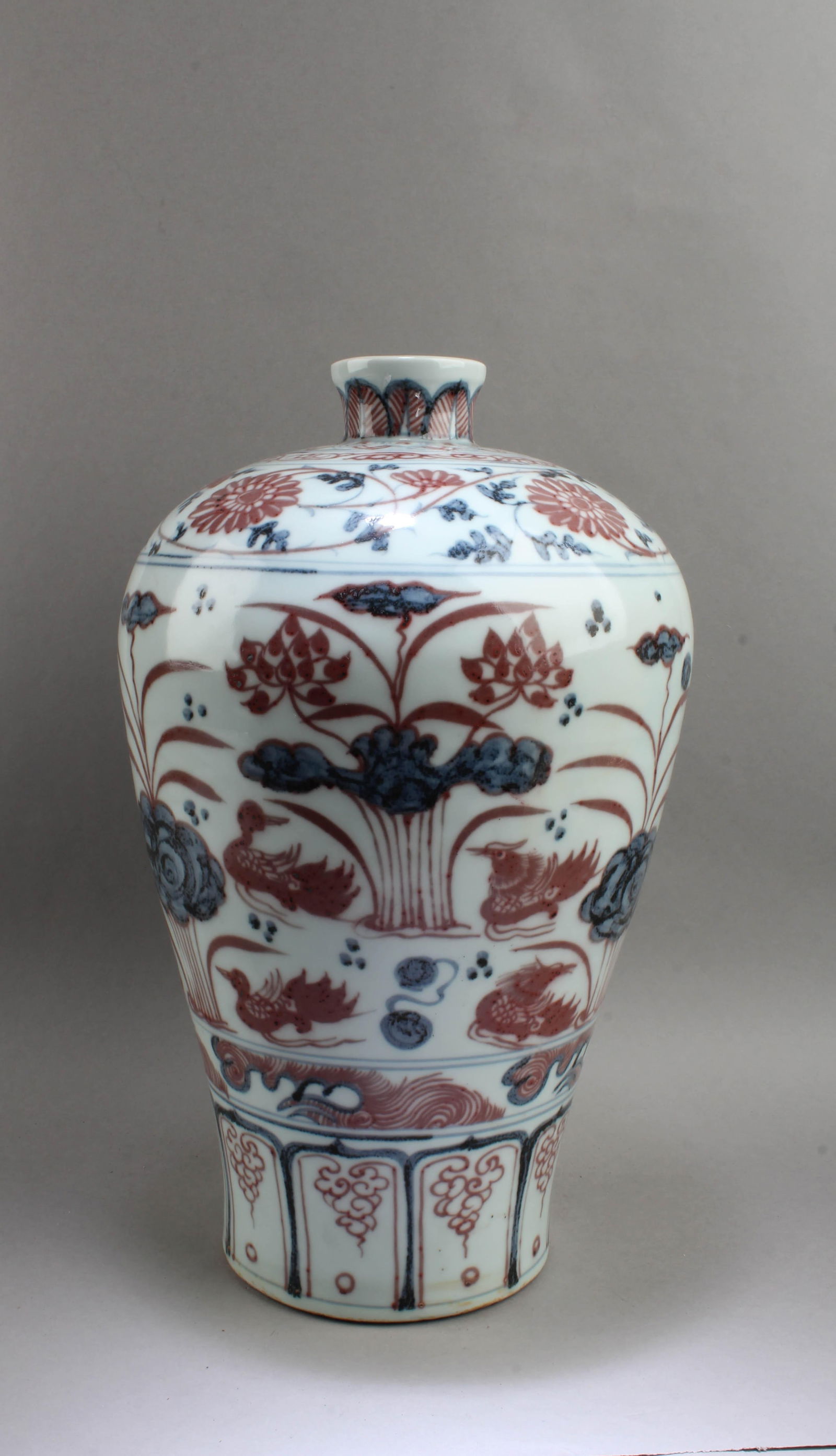 Chinese Iron Red Blue & White Meiping Vase: Chinese Iron Red Blue & White Meiping Vase. Height: 13.75"