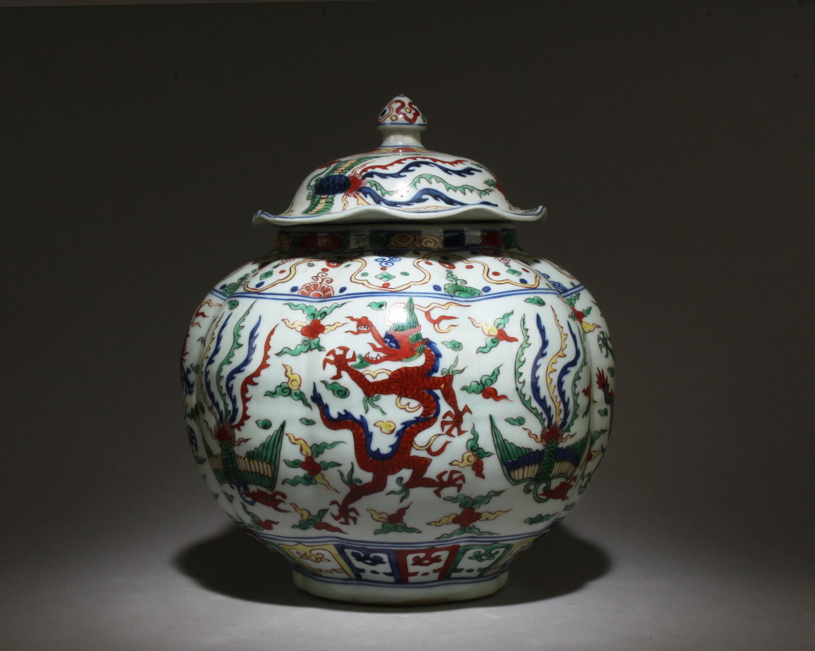 A Wucai Jar with Lid: A Wucai Jar with Lid. Dimensions: 11" x 9".