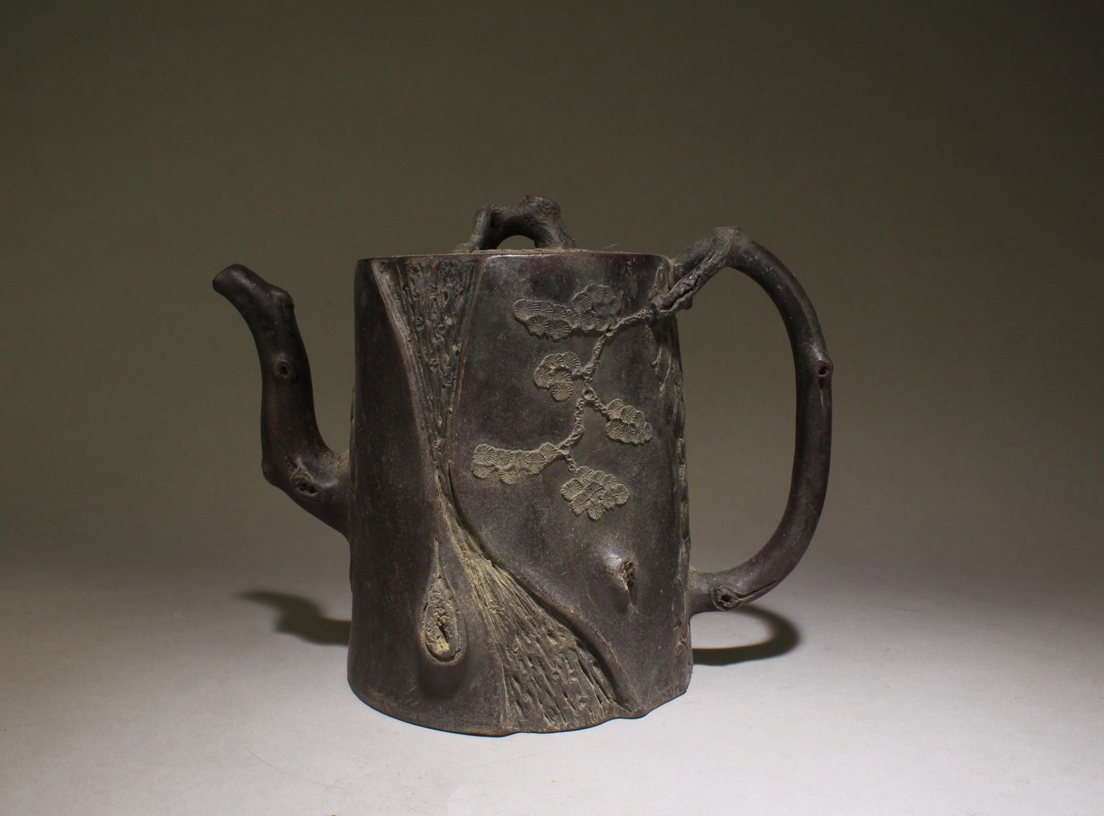 A Chinese Yixing Zisha Teapot: A Chinese Yixing Zisha Teapot. Dimensions: 6.5" x 8.5 ".