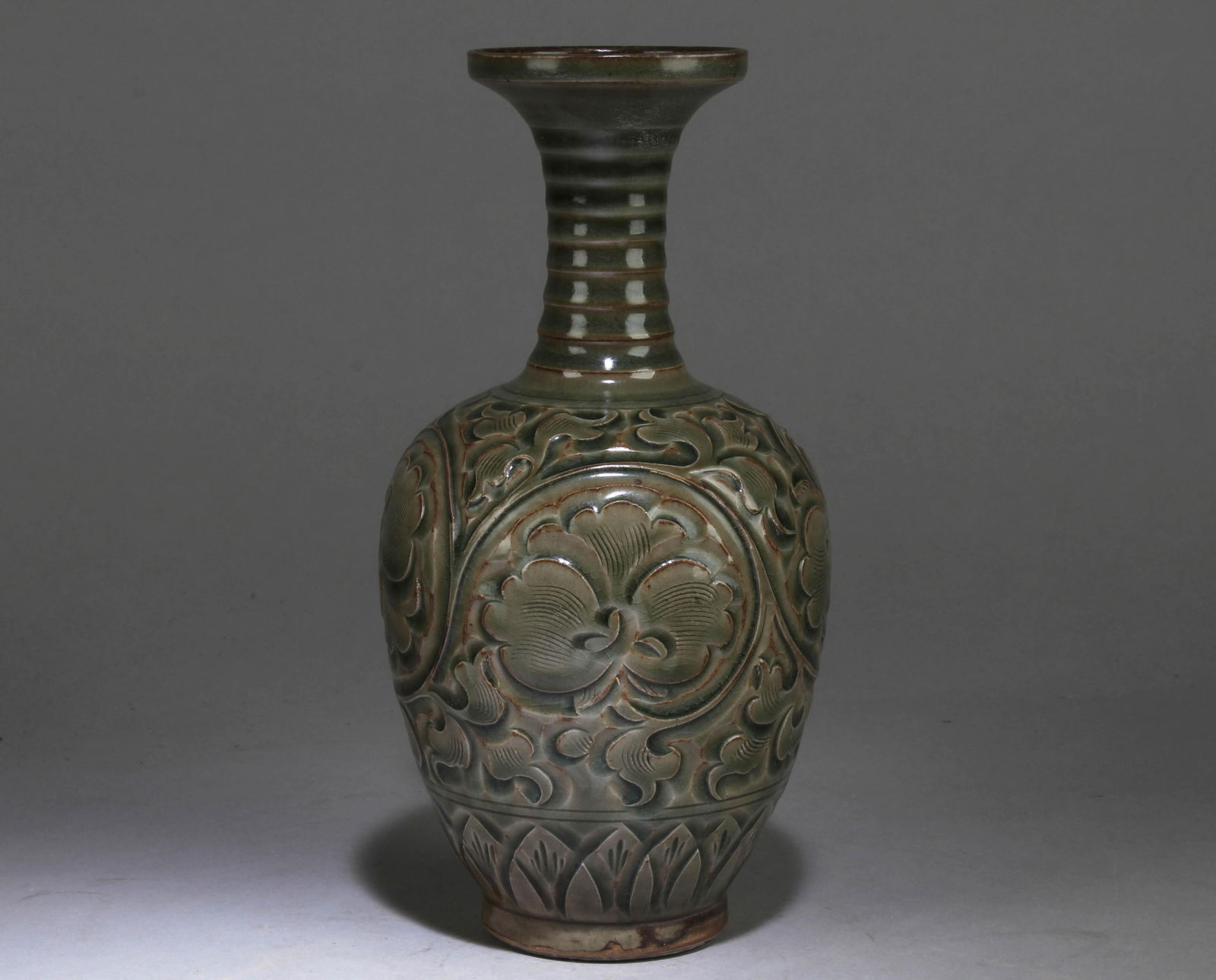 A Chinese Yaozhou Vase with a Floral Design: A Chinese Yaozhou Vase with a Floral Design. Dimension: 9.75" x 5.25".