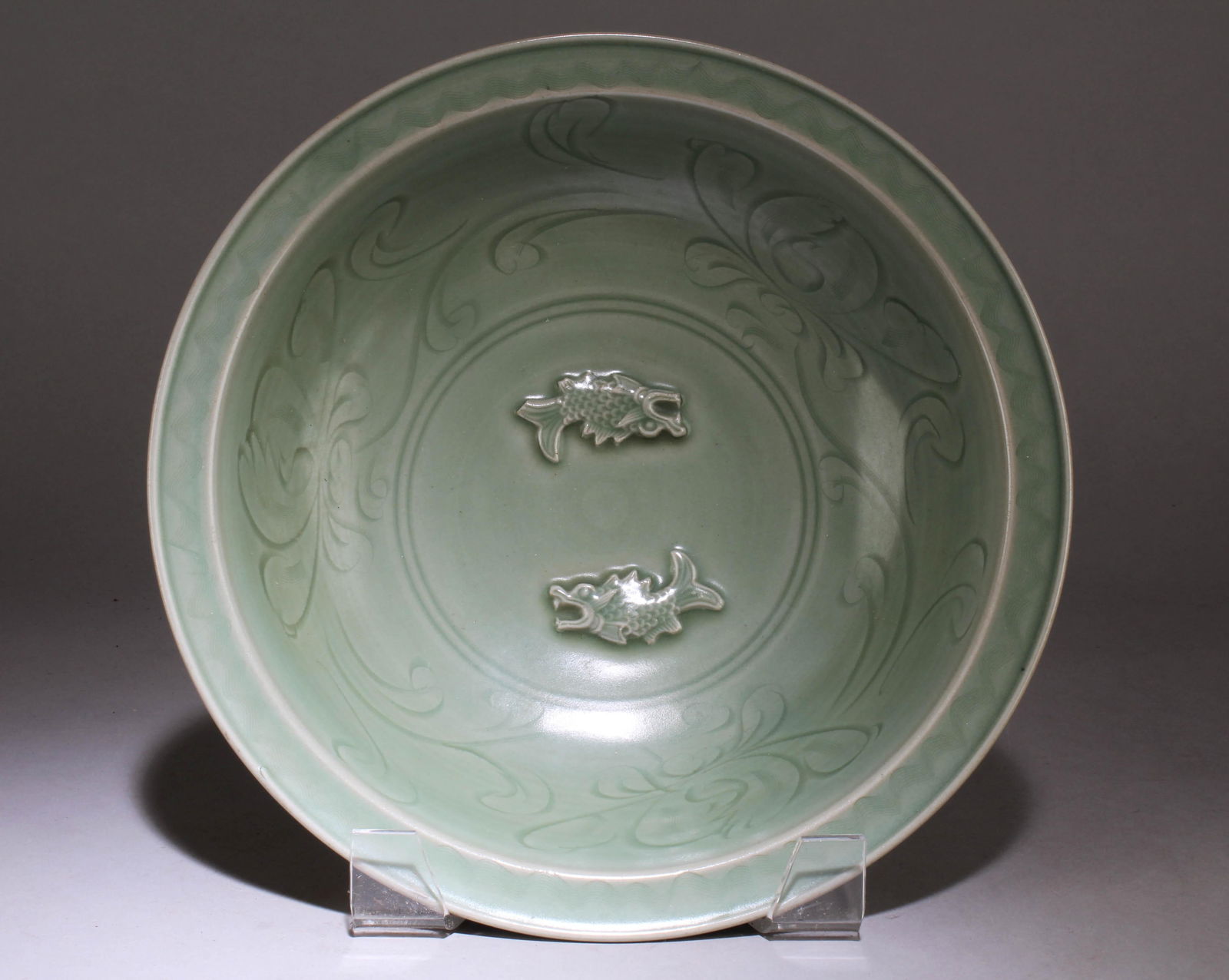 A Chinese Celedon Plate with Two Dragon Koi Fish: A Chinese Celedon Plate with Two Dragon Koi Fish. Dimension: 2.75" x 9.25".