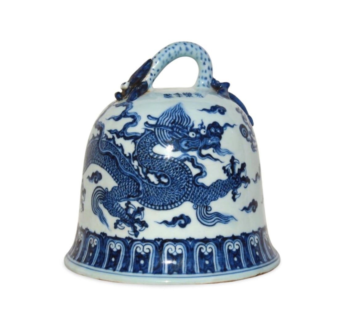 A Blue and White Bell-Shaped Ornament: A Blue and White Bell-Shaped Ornament. Dimension: 7.5" x 7.5".