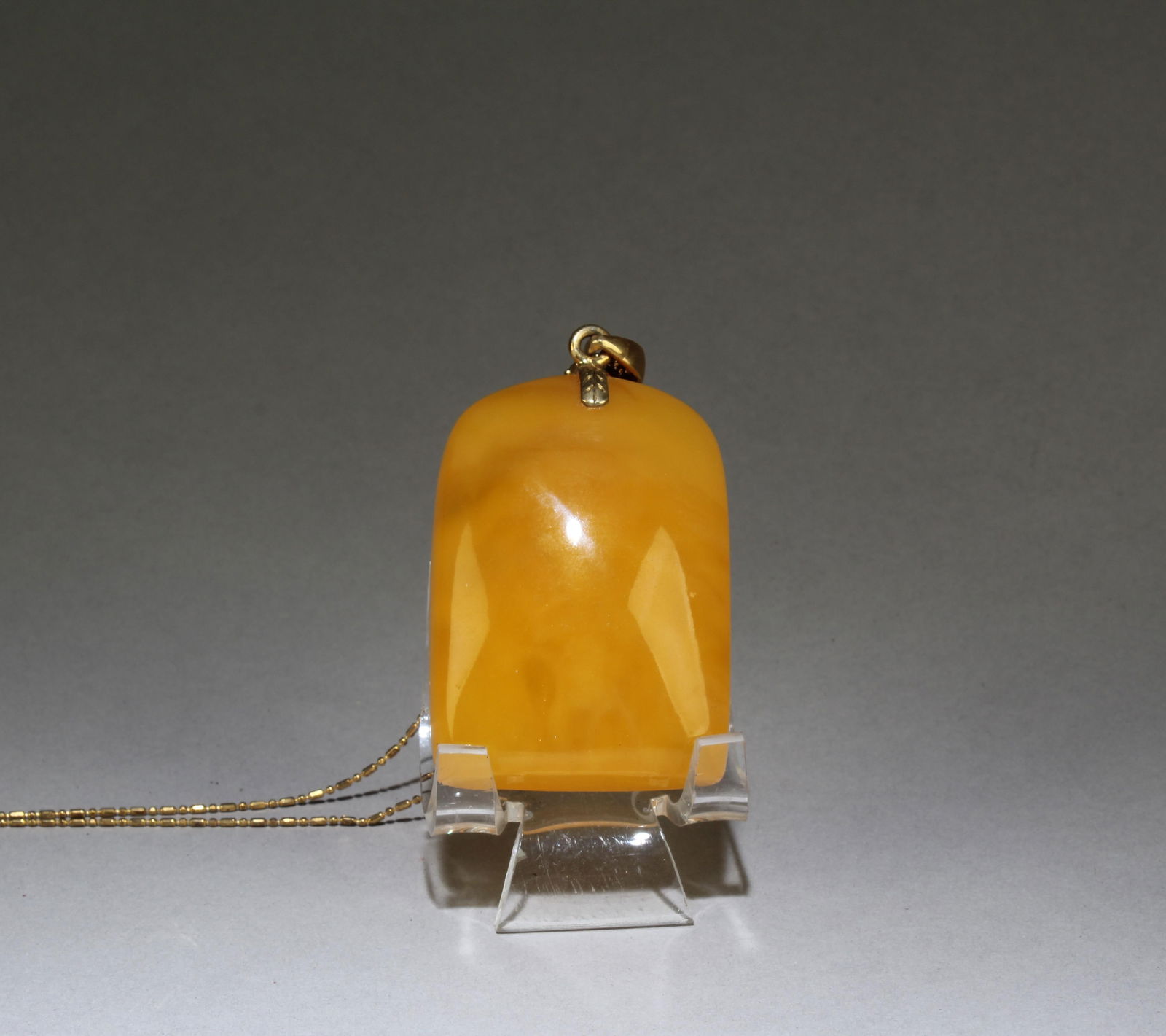 A Chinese Pendant: A Chinese Pendant. Dimensions: 1.5" x 2.25. Necklace Diameter: 9.5".