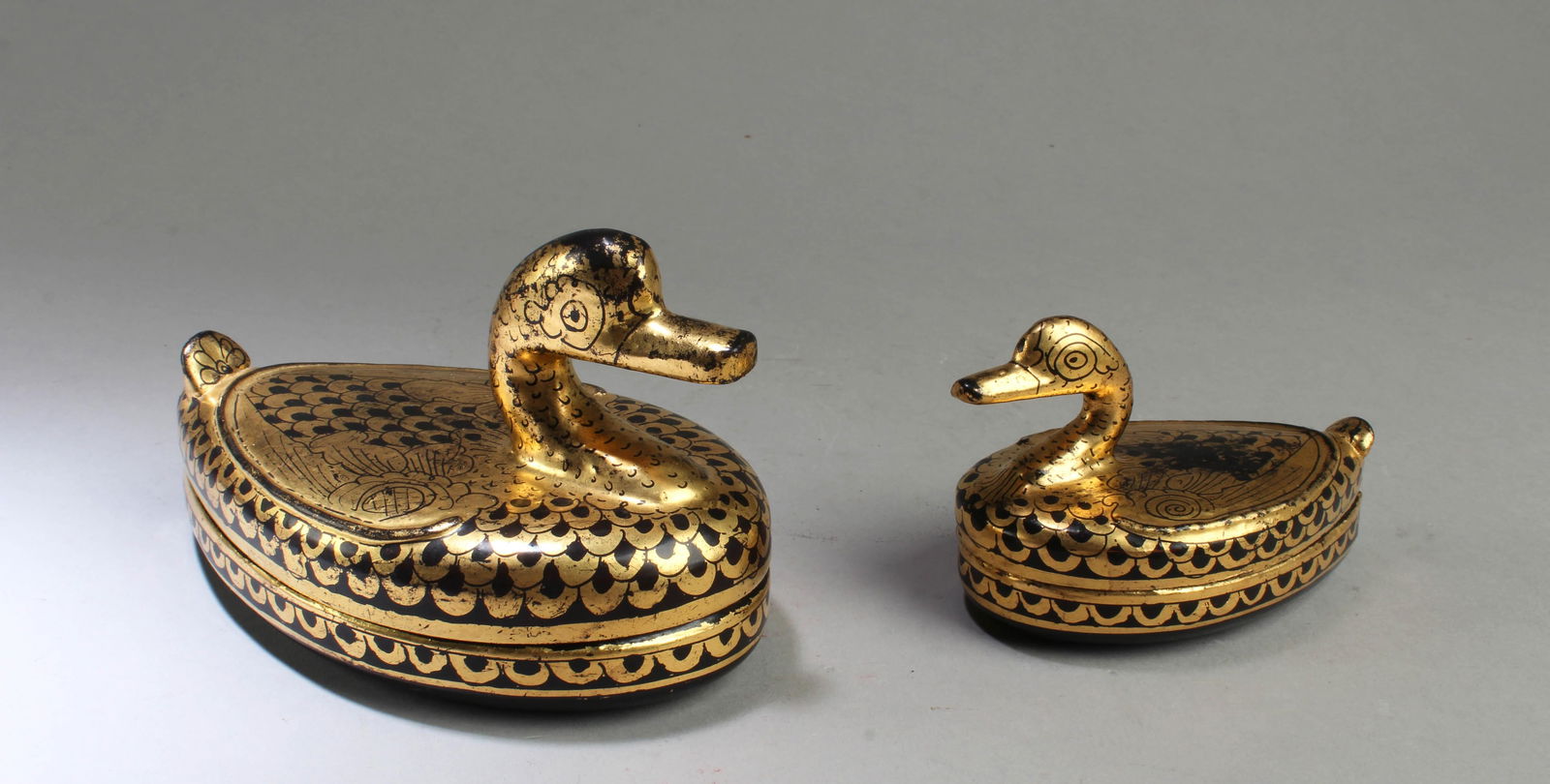 A Pair of Lacquer Swan Boxes: A Pair of Lacquer Swan Boxes. Length: 6" (Larger)