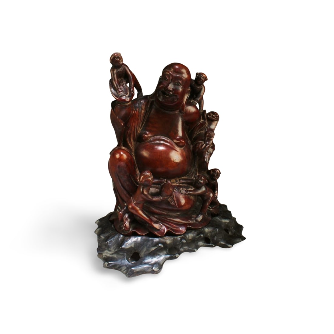 A Carved Wooden Smiling Buddha Statue: A Carved Wooden Smiling Buddha Statue. Comes fitted with a wooden stand. Height: 11" (include stand)