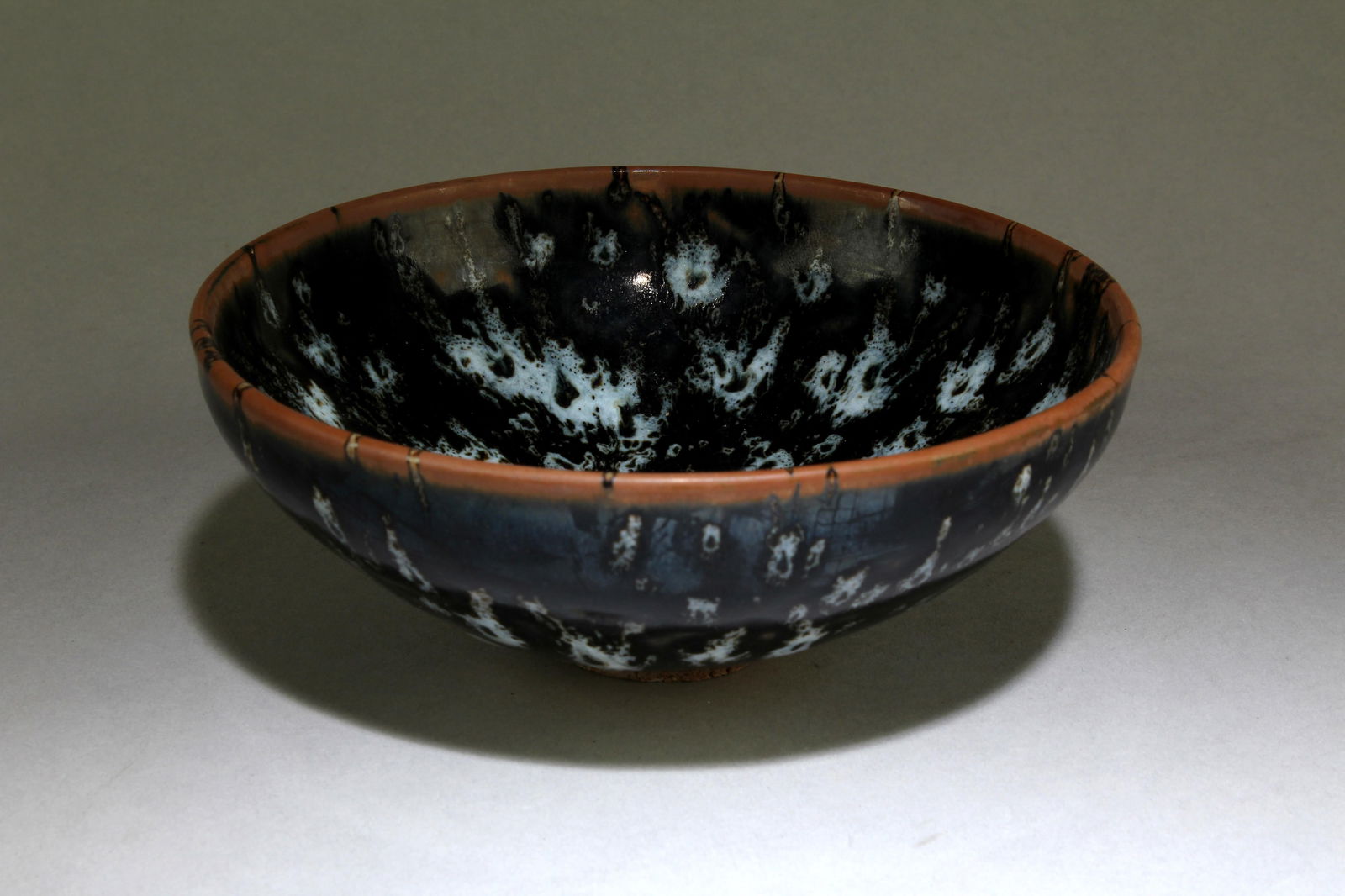 A Chinese JiZhou Tea Bowl: A Chinese JiZhou Tea Bowl. Dimensions: 2.5" x 6".