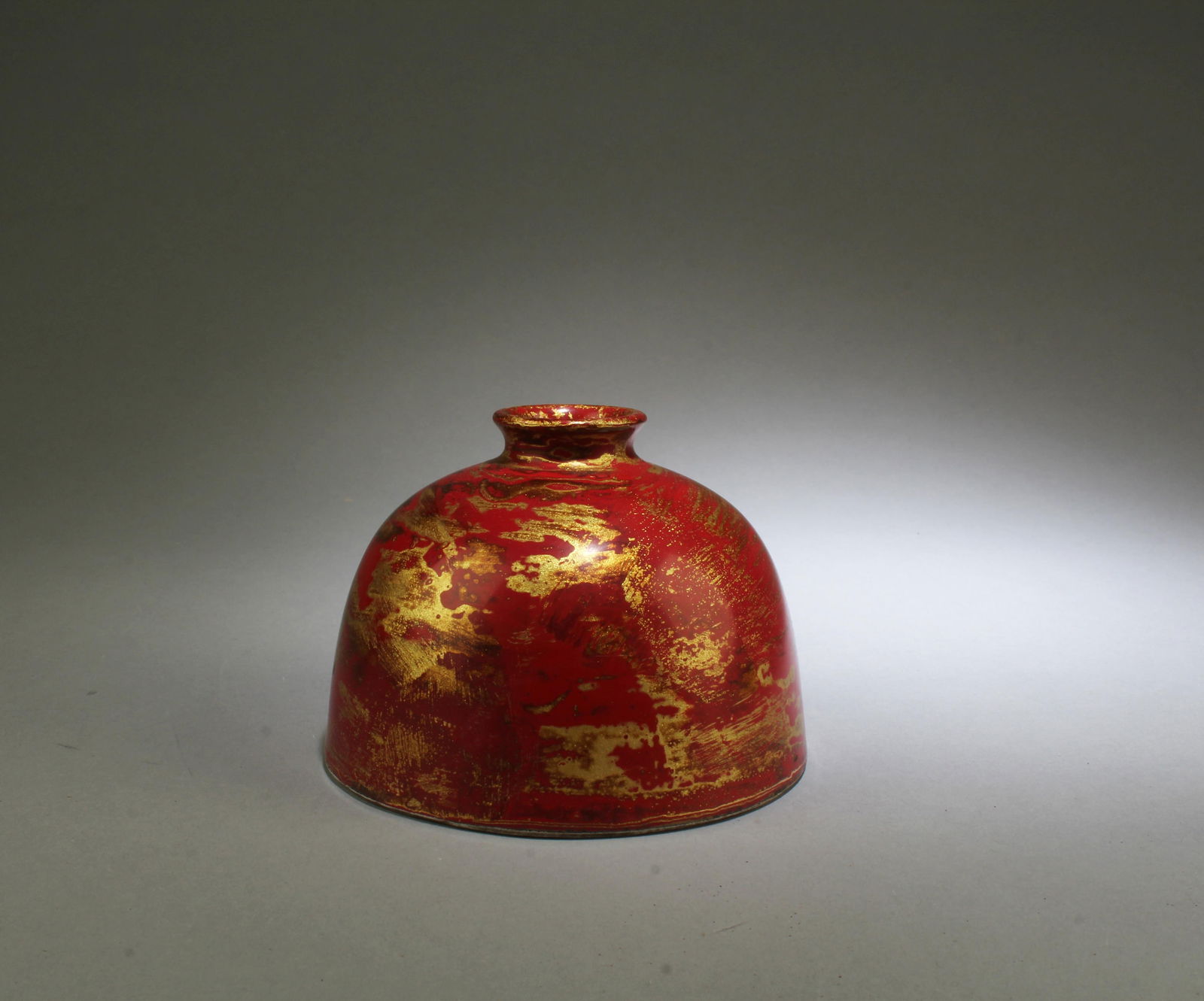 A Porcelain Water Pot: A Porcelain Water Pot. 'KamgXi' mark. Base Diameter: 4.25" Height: 3.2"