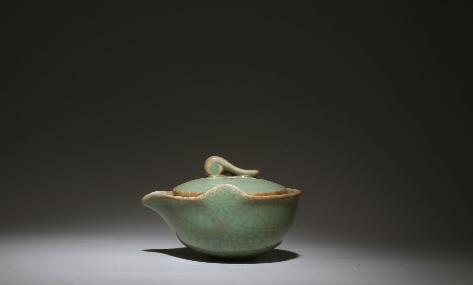 A Ruyao Teapot: A Ruyao Teapot. Dimensions: 5.2" x 3.3".
