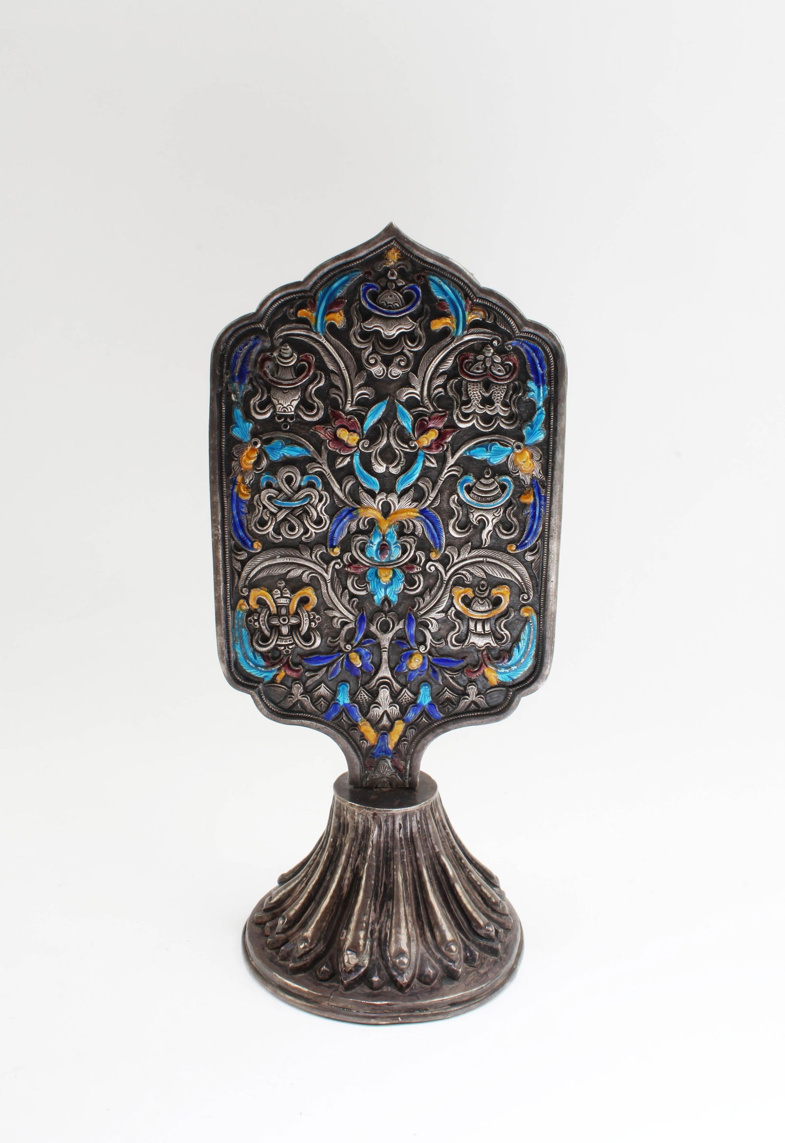 A Silver Tibetan Ornament: A Silver Tibetan Ornament. Height: 7.75"