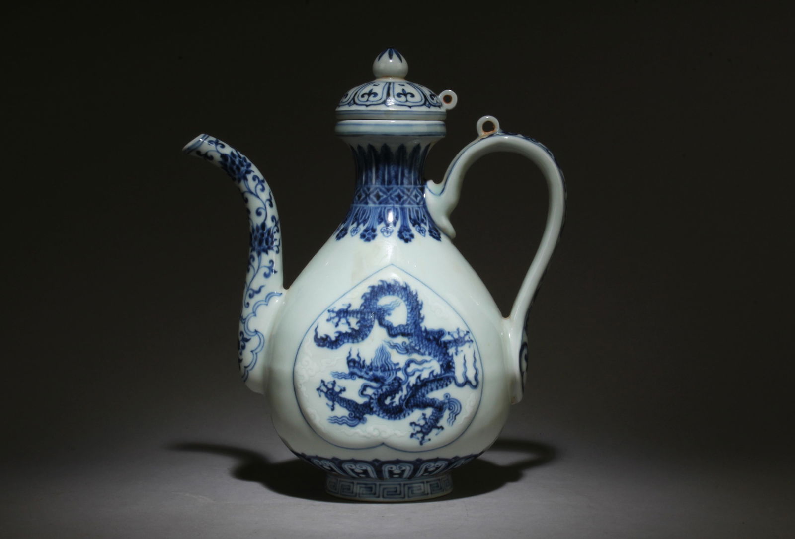 A Blue and White Teapot: A Blue and White Teapot. Dimensions: 10" x 8.5".