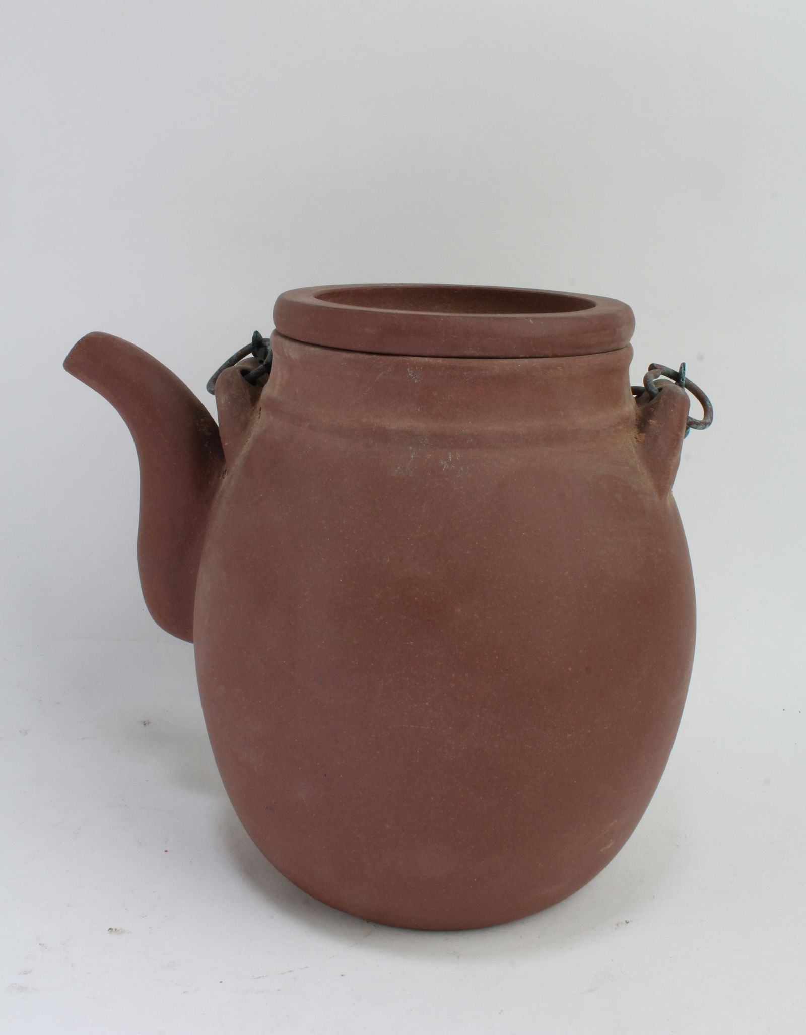 Chinese Zisha Teapot: Chinese Zisha Teapot with a short spout. Length: 5.25"