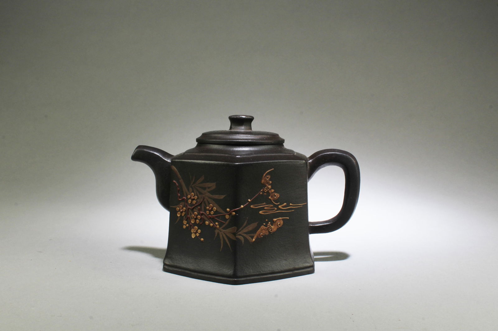 A Zisha Teapot: A Zisha Teapot. Length: 6.5" Height: 4.2"