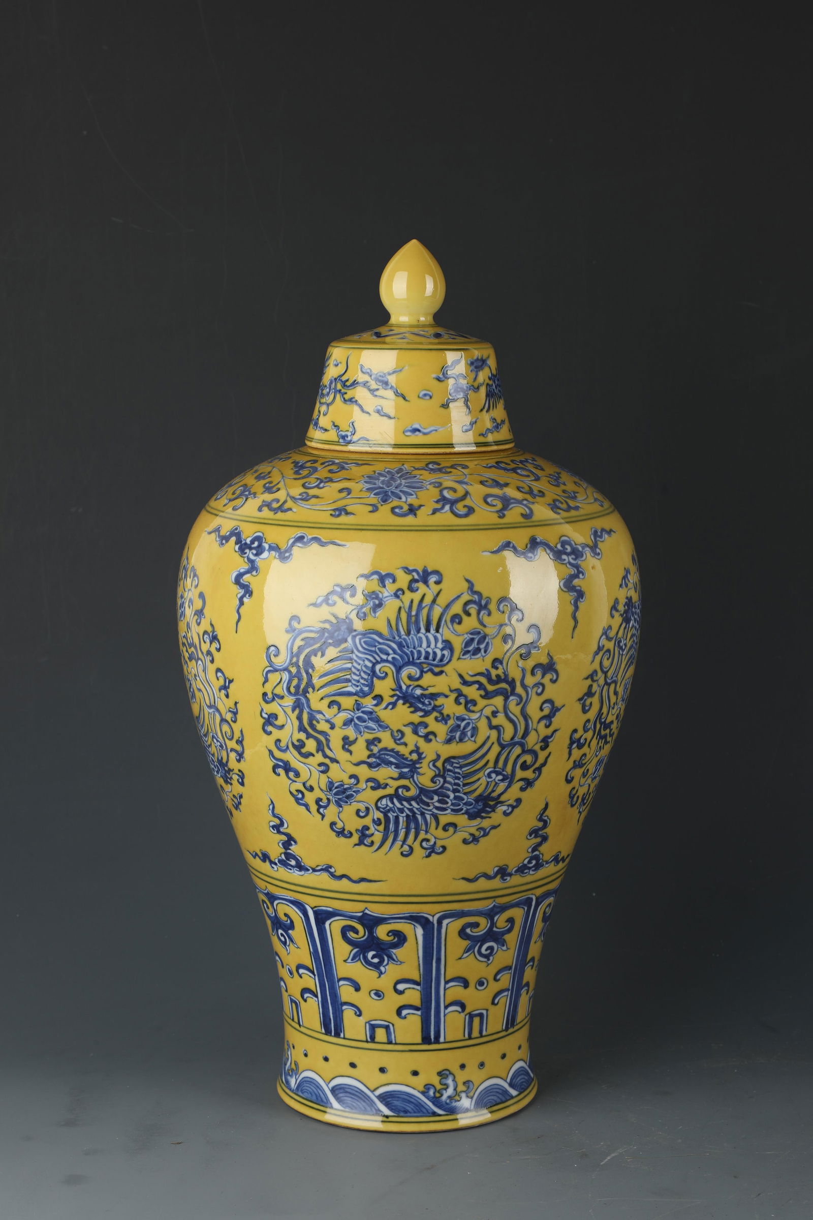 A Famille Jaune Phoenix Meiping Vase with Lid: A Famille Jaune Porcelain Meiping Vase with lid, depicting phoenixes. 'ChengHua' mark at base. Height: 14"