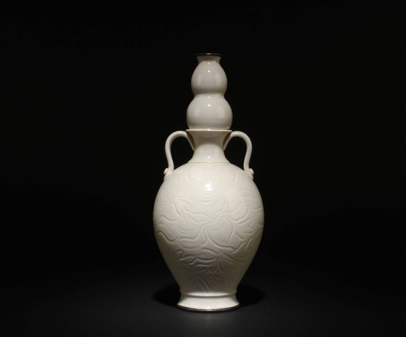 A Dingyao Vase: A Dingyao Vase. Dimensions: 12" x 5".