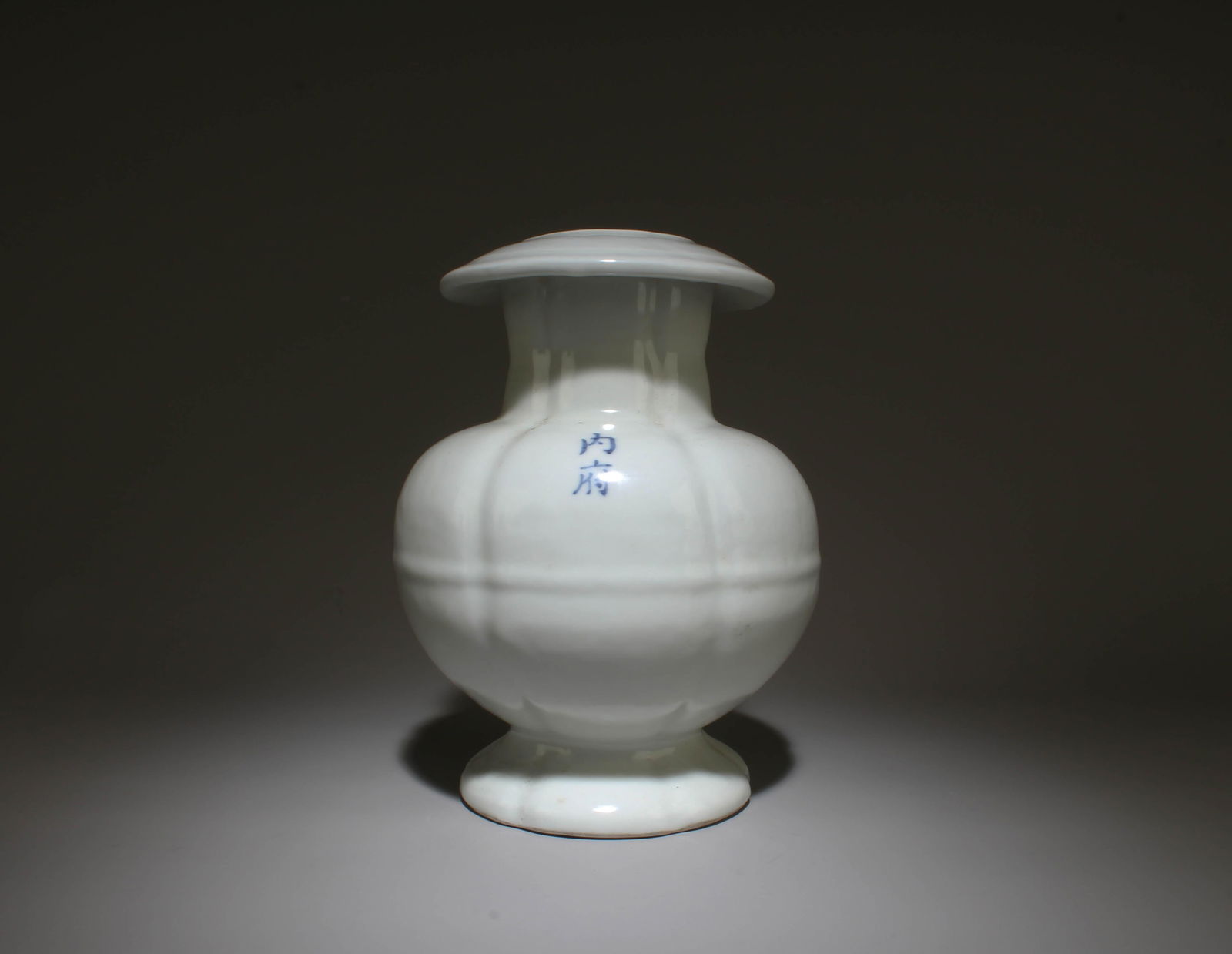A White Glazed Vase: A White Glazed Vase. Dimensions: 8.2" x 6".
