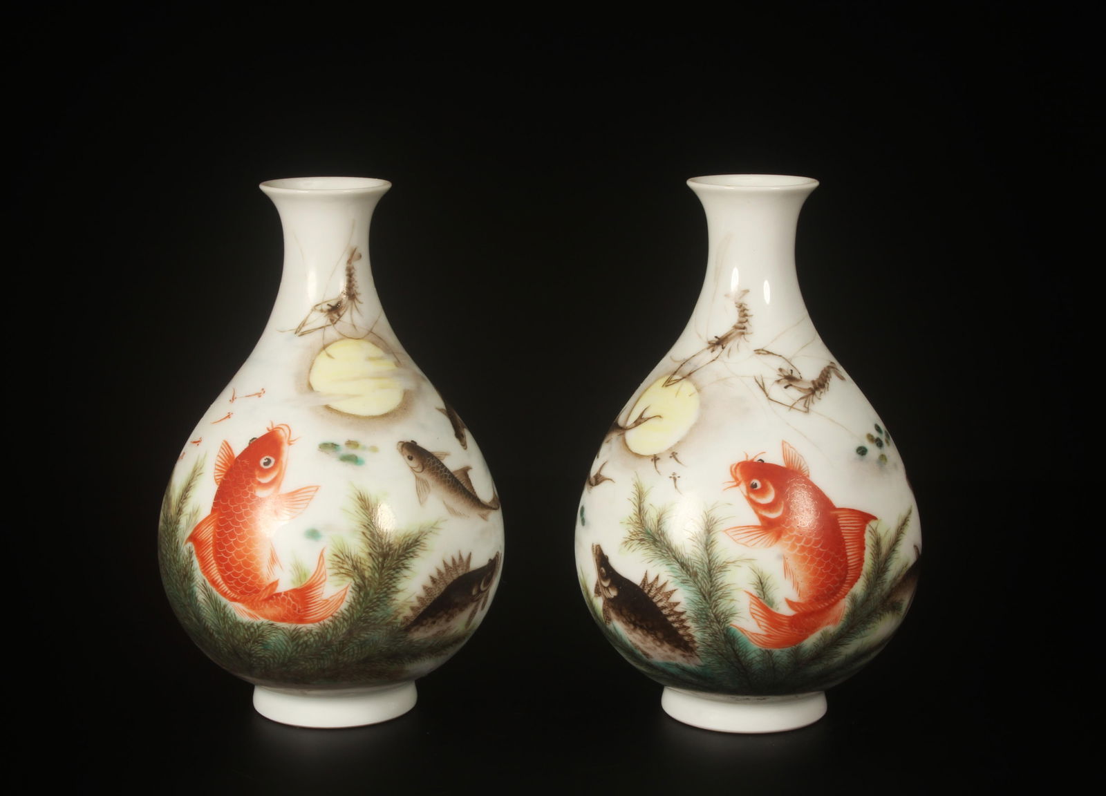 A Pair of Porcelain Vases: A Pair of Porcelain Vase. Dimensions: 6" X 4"