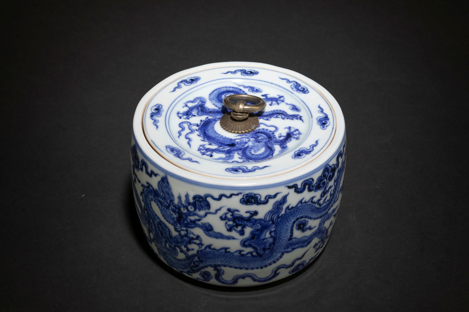 A Blue & White Porcelain Container: A Blue & White Porcelain Container. Diameter: 5.5" Height: 3.75"