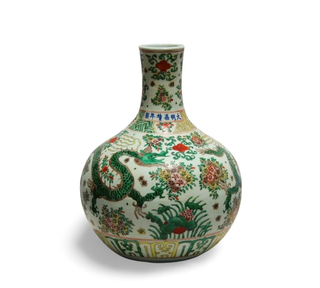 A Doucai Celestial Sphere Vase: A Doucai Celestial Sphere Vase. Dimension: 17" x 11".