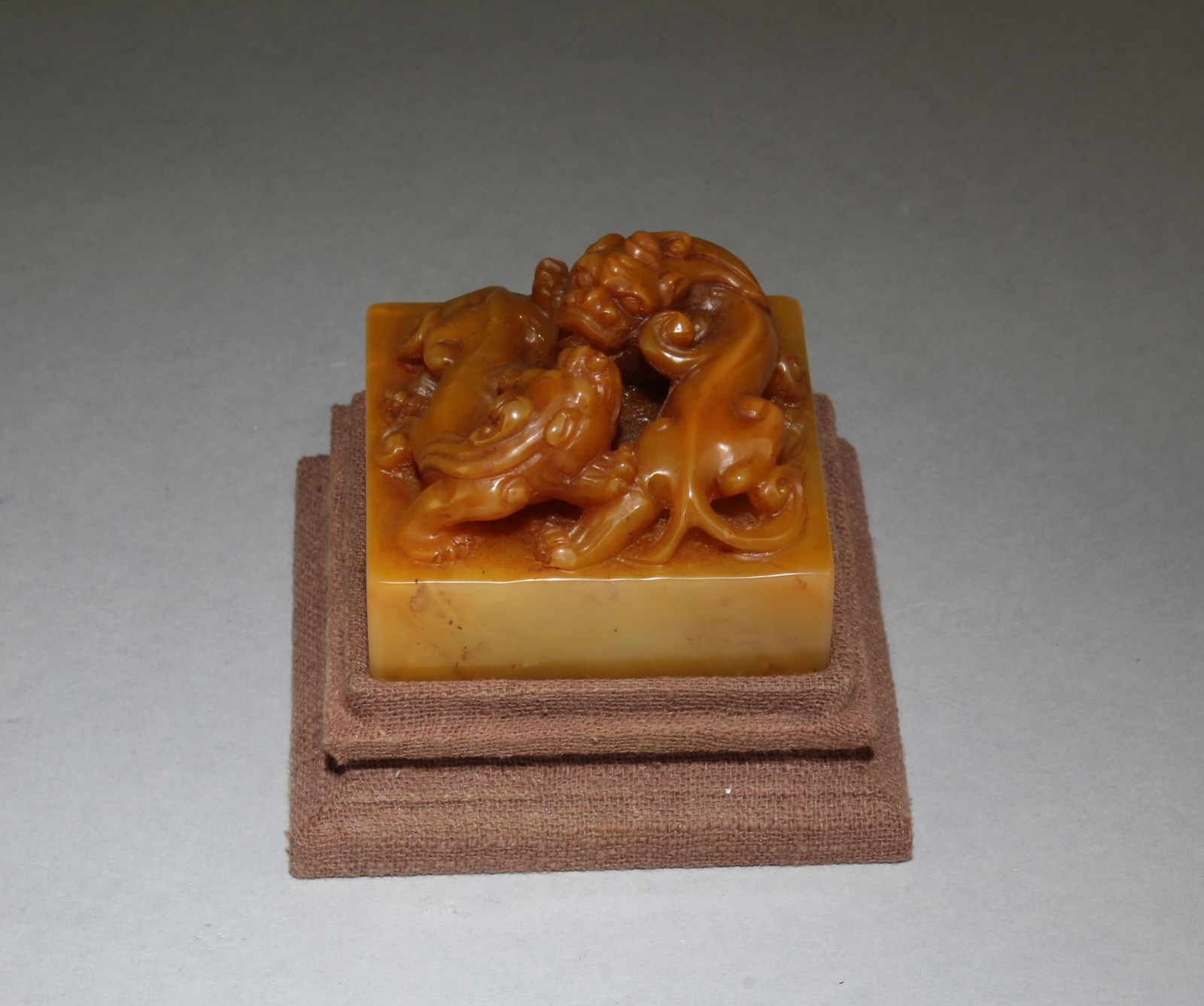 Chinese Square Shaped TianHuang Stone Seal: Chinese Square Shaped TianHuang Stone Seal. Comes fitted with a base. Length: 2.25" Width: 2.25"