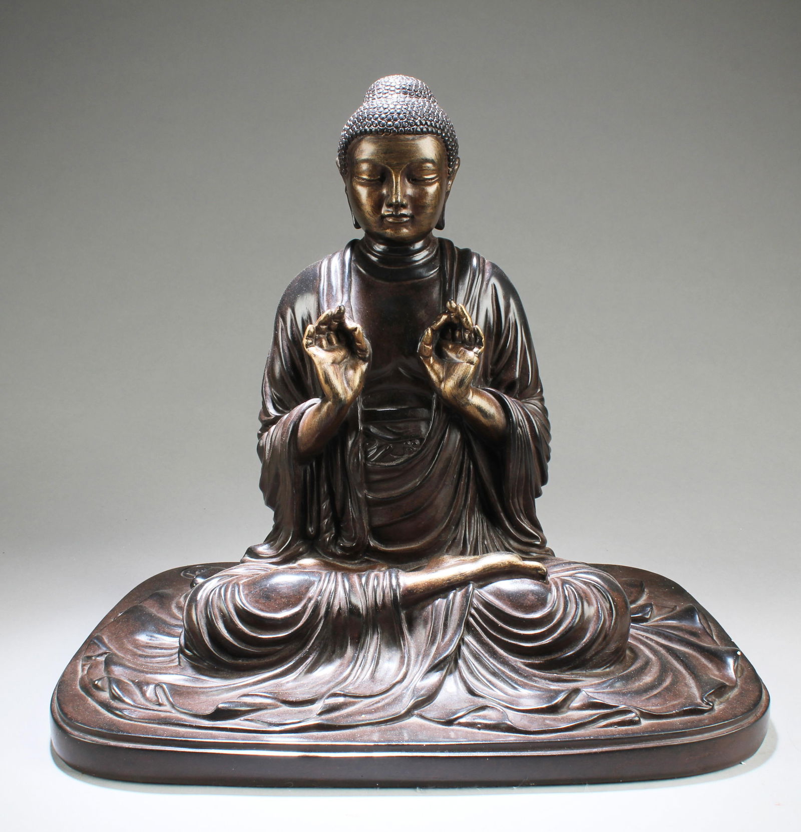 A Pottery Seated Buddha Statue: A Pottery Seated Buddha Statue. Height: 12"
