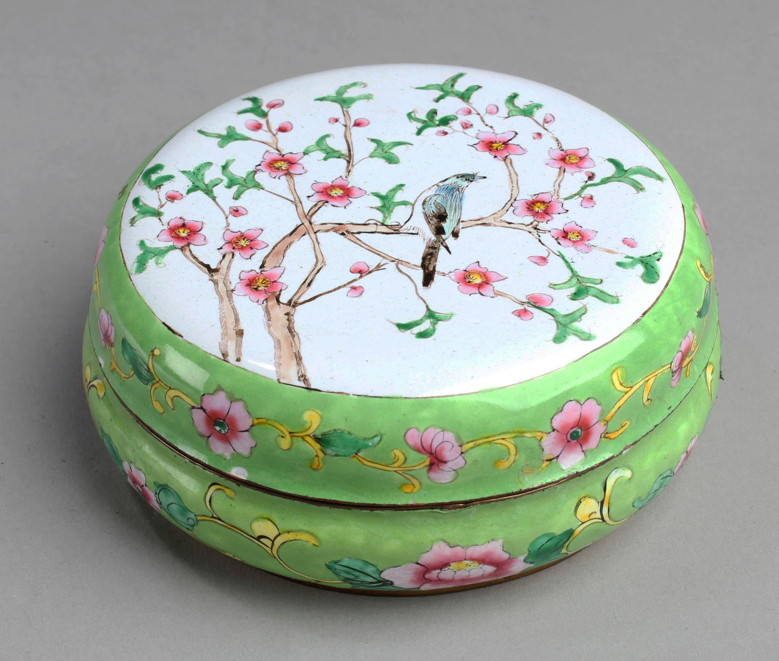 Antique Enamel Glazed Round Container: Antique Enamel Glazed Round Container, decorated with bird and Flower. Diameter: 4.25"