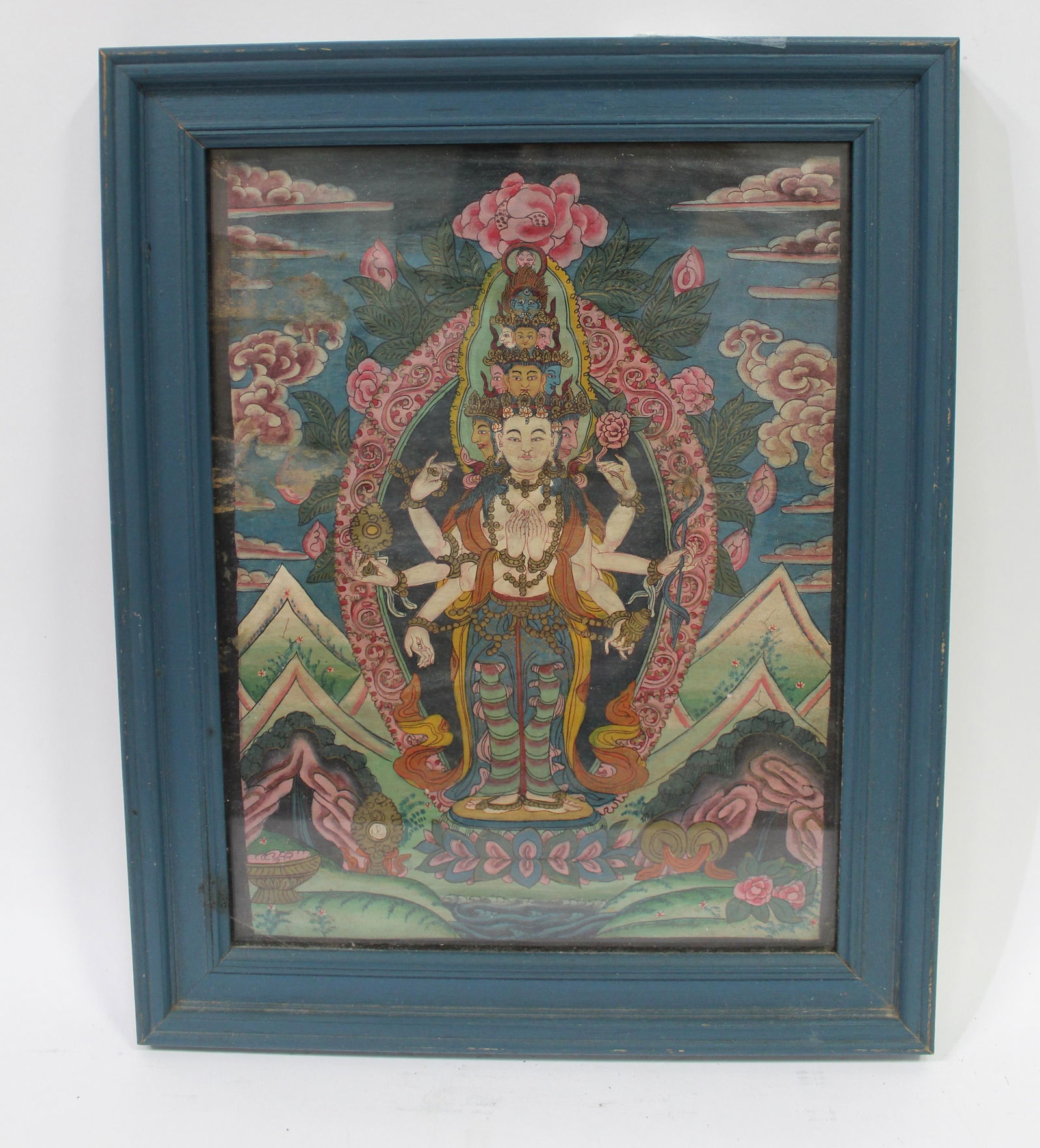 A Framed Thangka: A Framed Thangka. Length: 10.5" Height: 13" (Frame)