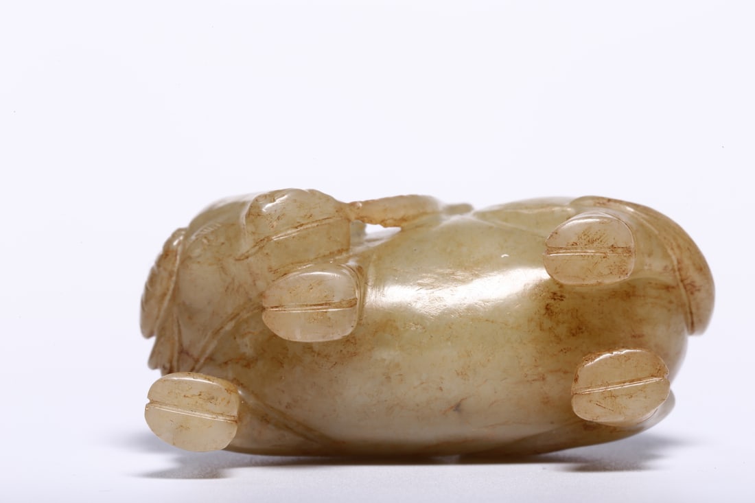 A Hetian Jade Boy and Ox Carving: A Hetian Jade Boy and Ox Carving. Dimensions: 2.17" x 0.98" x 2.01"; Weight: 0.198lbs.