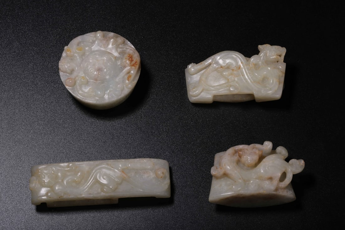 A Set of Hetian White Jade Chilong Sword Ornaments: A Set of Hetian White Jade Chilong Sword Ornaments. Dimensions: 3.54" x 0.98" x 0.71"; Weight: 0.73lbs.
