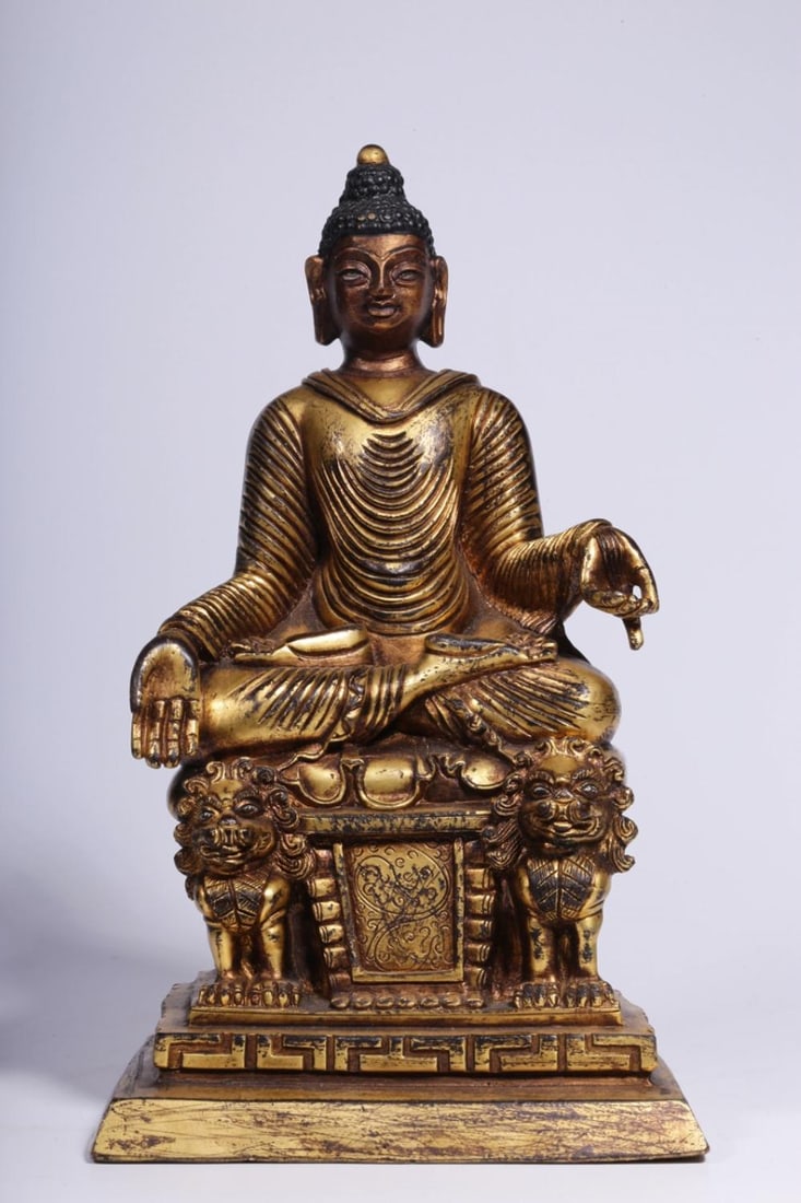 A Gilt Bronze Acala Buddha Statue: A Gilt Bronze Acala Buddha Statue. Dimensions: 8.27" x 4.92" x 3.35"; Weight: 4.345lbs.