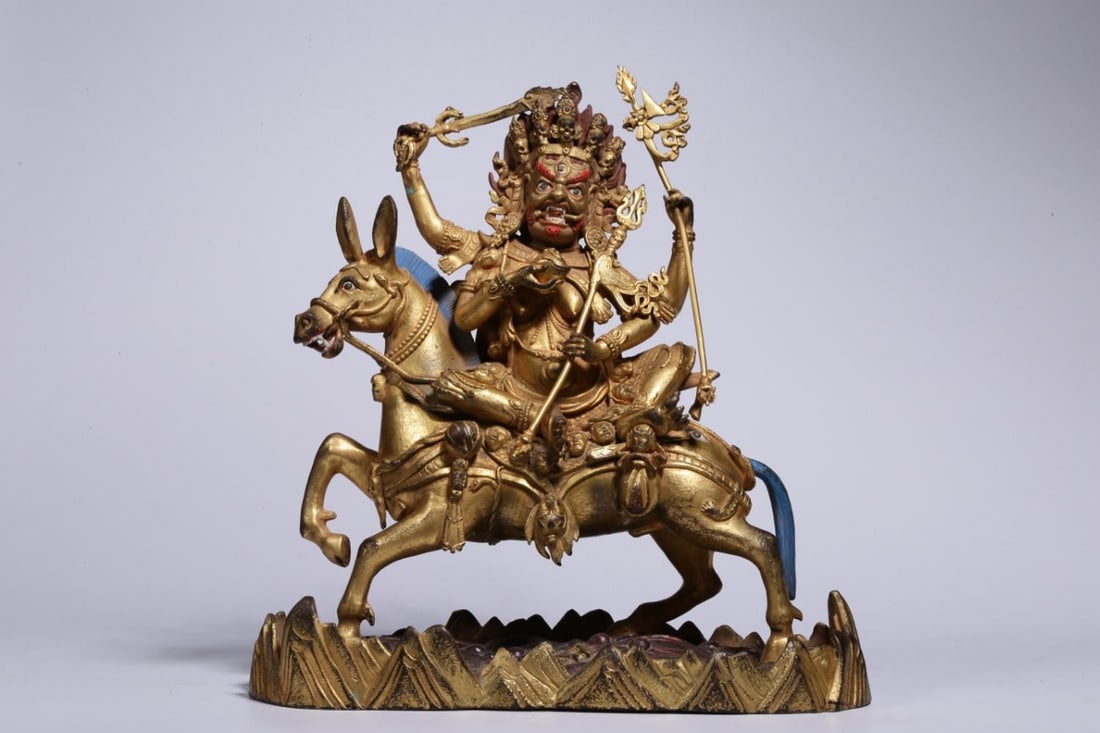 A Gilt Bronze Shri Devi Statue: A Gilt Bronze Shri Devi Statue. Dimensions: 8.66" x 8.46" x 3.74"; Weight: 5.701lbs.