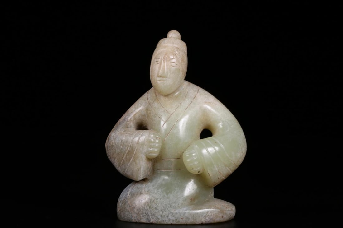 An Archaic Jade Ornament: An Archaic Jade Ornament. Dimensions: 3.74" x 2.60" x 1.50"; Weight: 0.461lbs.