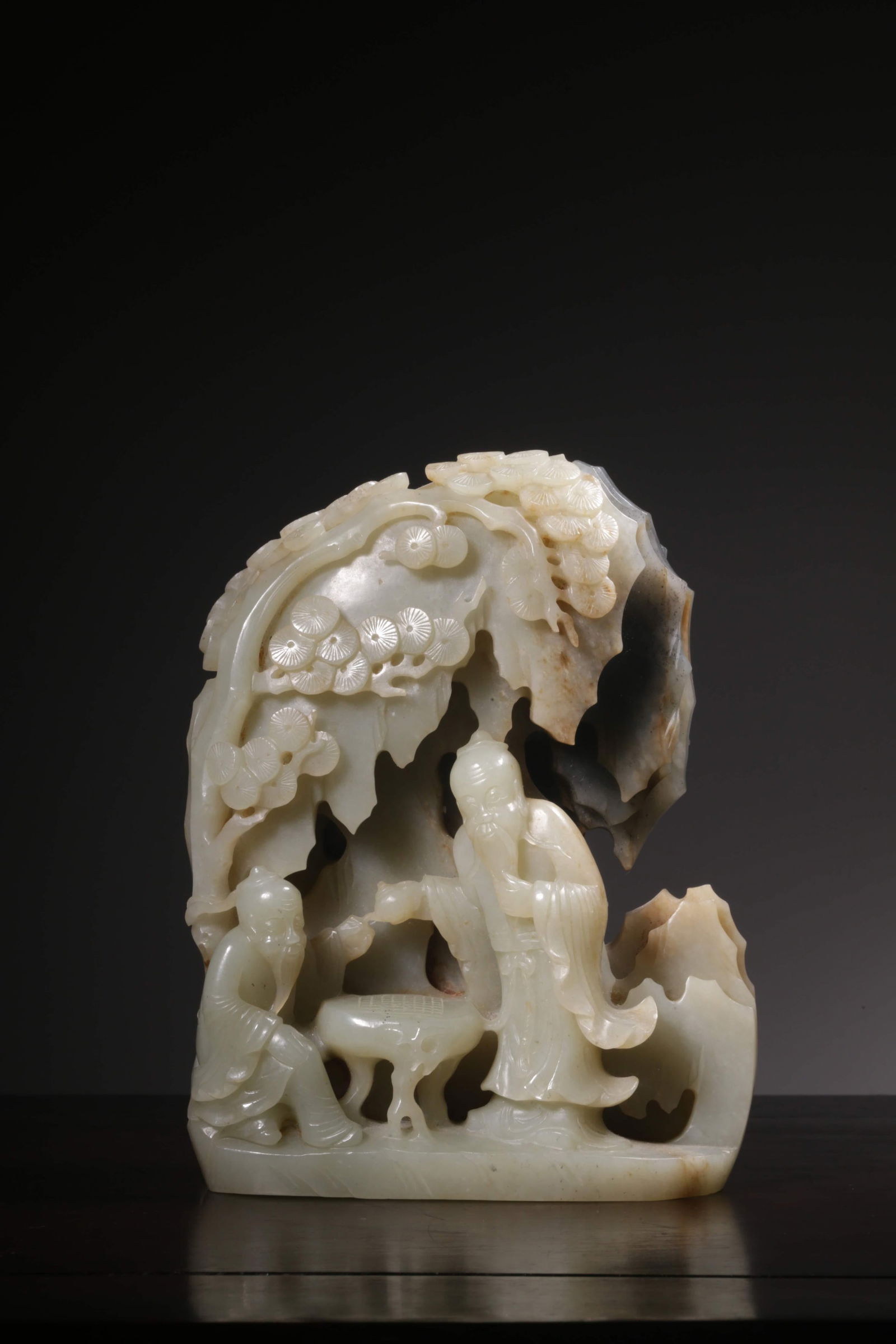 A Hetian Jade Scholar Under Pine Ornament: A Hetian Jade Scholar Under Pine Ornament. Height: 6.38"; Width: 4.72"; Thickness: 2.56"; Weight: 4.444lbs.