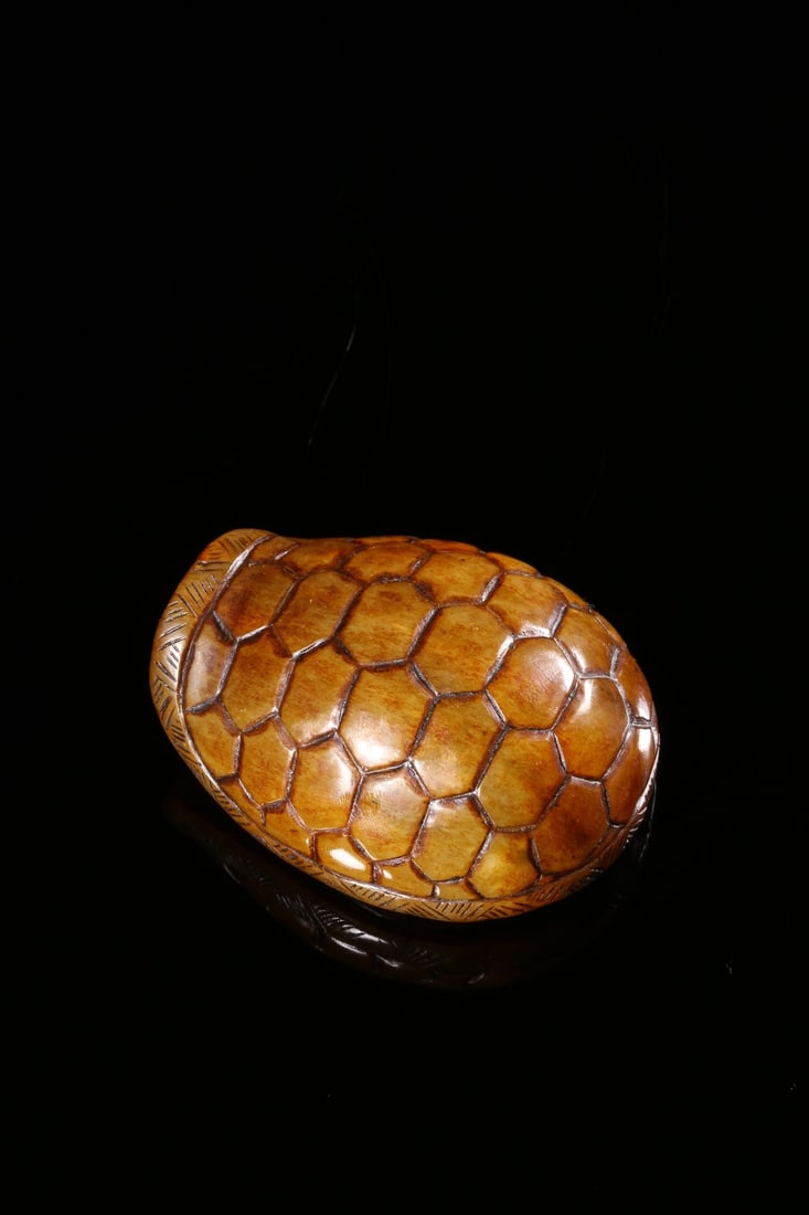 An Archaic Jade Tortoise Shell: An Archaic Jade Tortoise Shell. Dimensions: 2.99" x 2.36" x 1.42"; Weight: 0.578lbs.