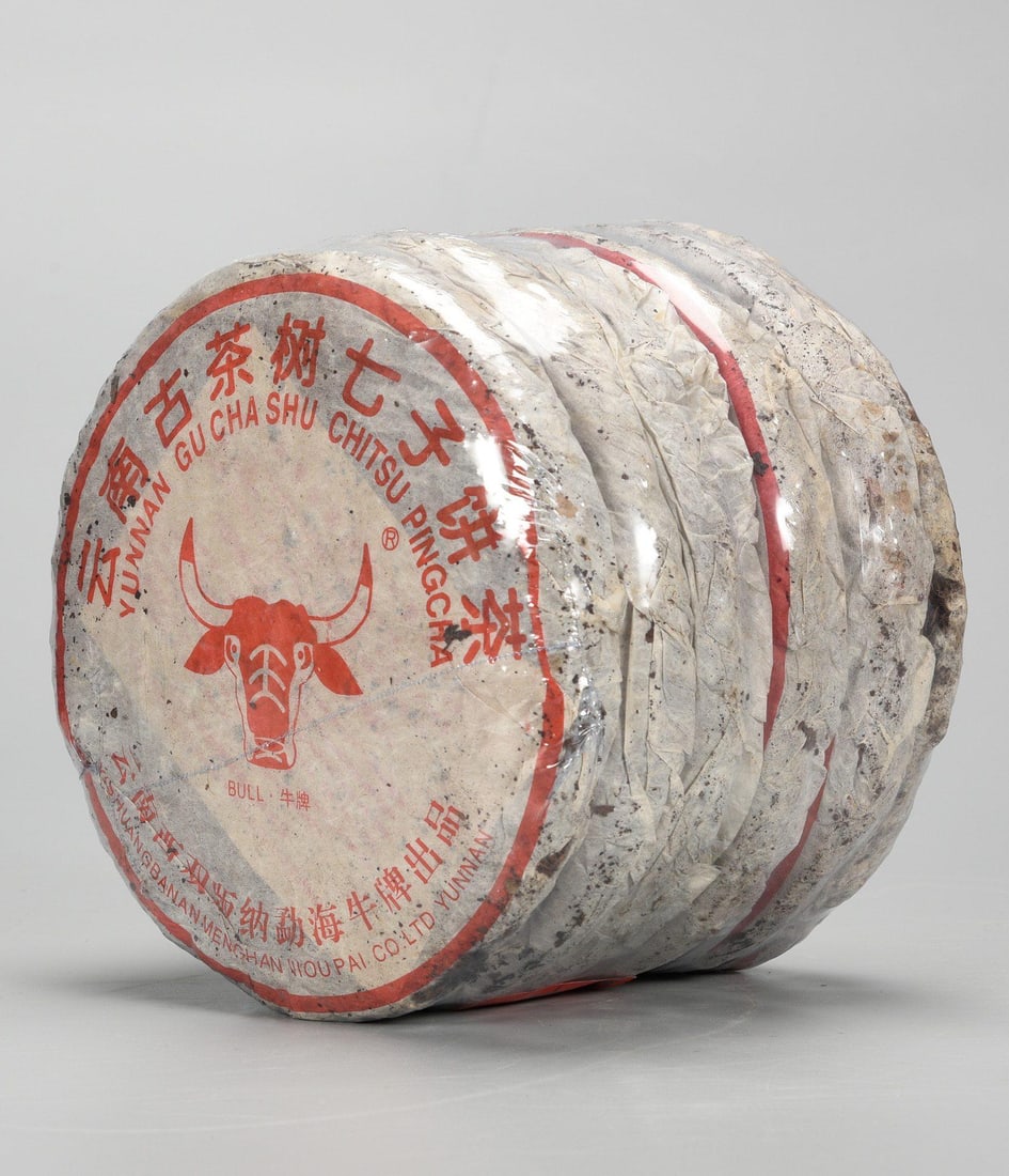 A Pu’er Tea Brick: A Pu’er Tea Brick. Total Weight: 5.51lbs.