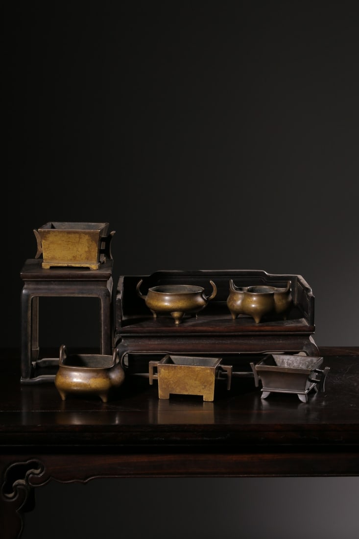 A Bronze Set of Six Censers: A Bronze Set of Six Censers. Height: 2.56"; Width: 2.24"; Thickness: 2"; Weight: 156g