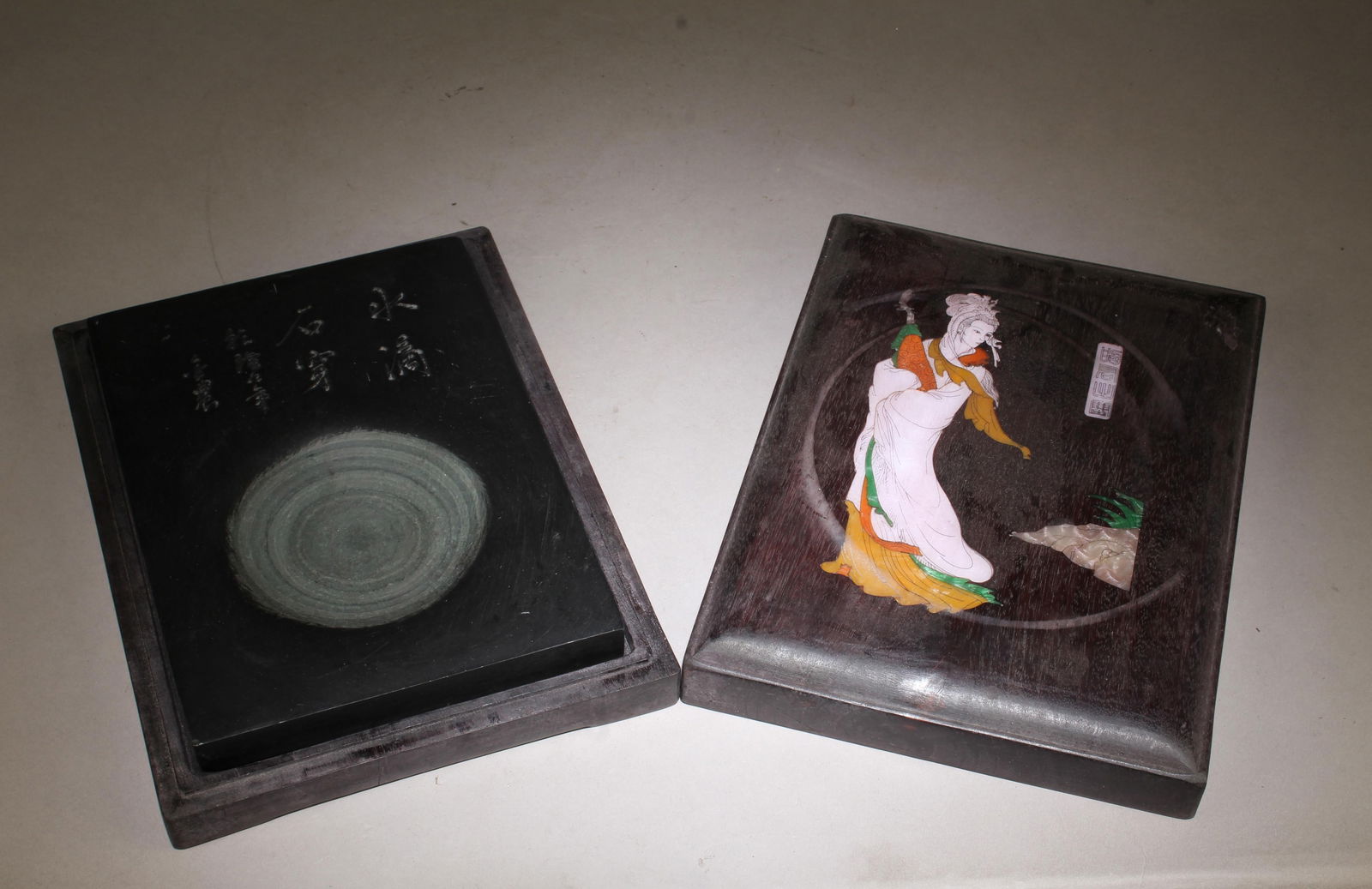 A Finely Carved Stone Ink with Wooden Box: A Finely Carved Stone Ink with Wooden Box. A Finely Carved Stone Ink with Wooden Box. Dimensions: 2" x 6.5" x 8.5".