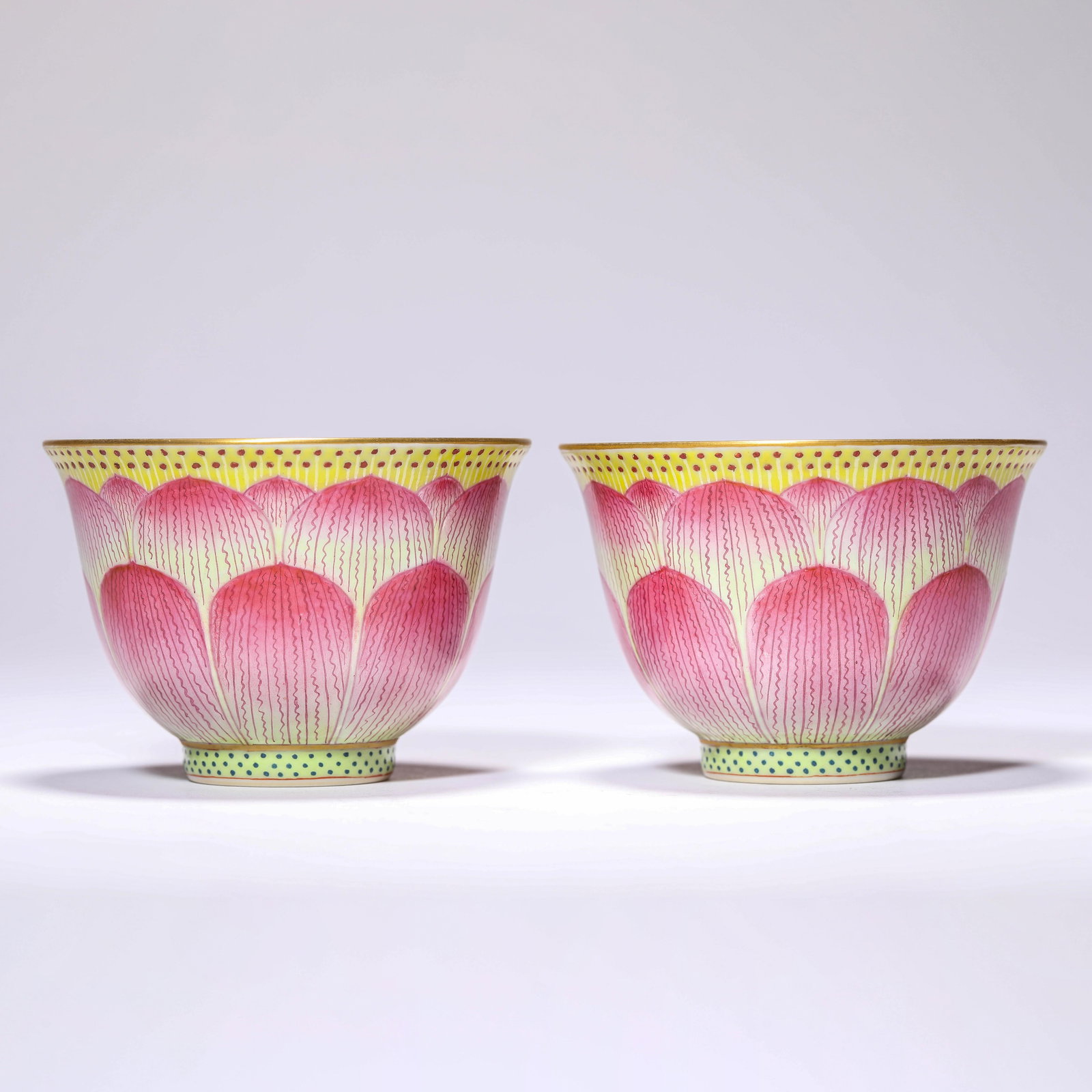Pair of Famille Rose Lotus-Decorated Cups: Pair of Famille Rose Lotus-Decorated Cups. Width:3.54" Height:2.48"