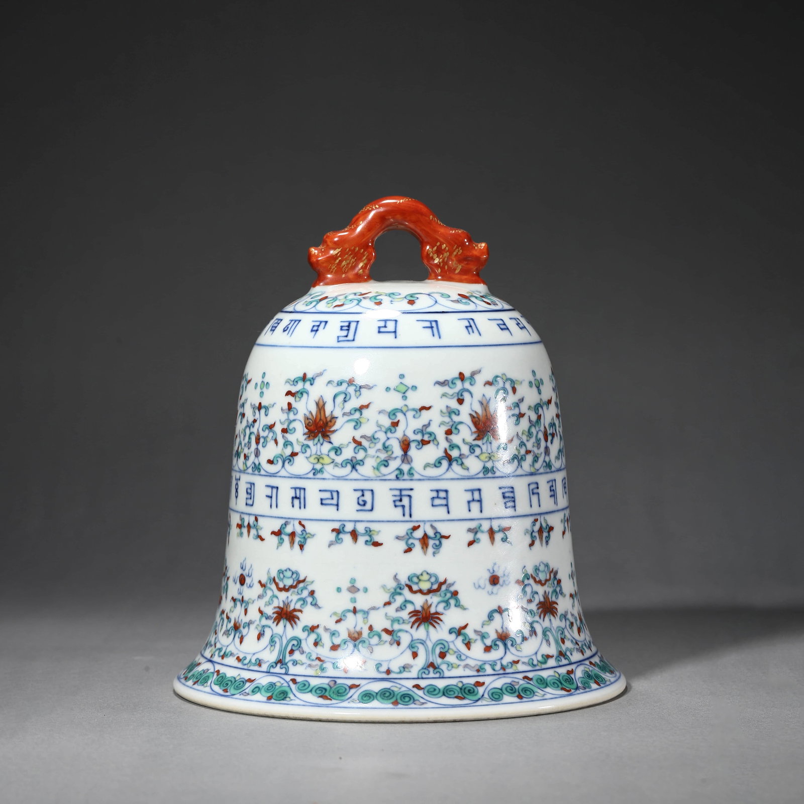 Doucai Glaze Interlocking Lotus Sanskrit Bell: Doucai Glaze Interlocking Lotus Sanskrit Bell. Diam.5.71" Height:6.30"