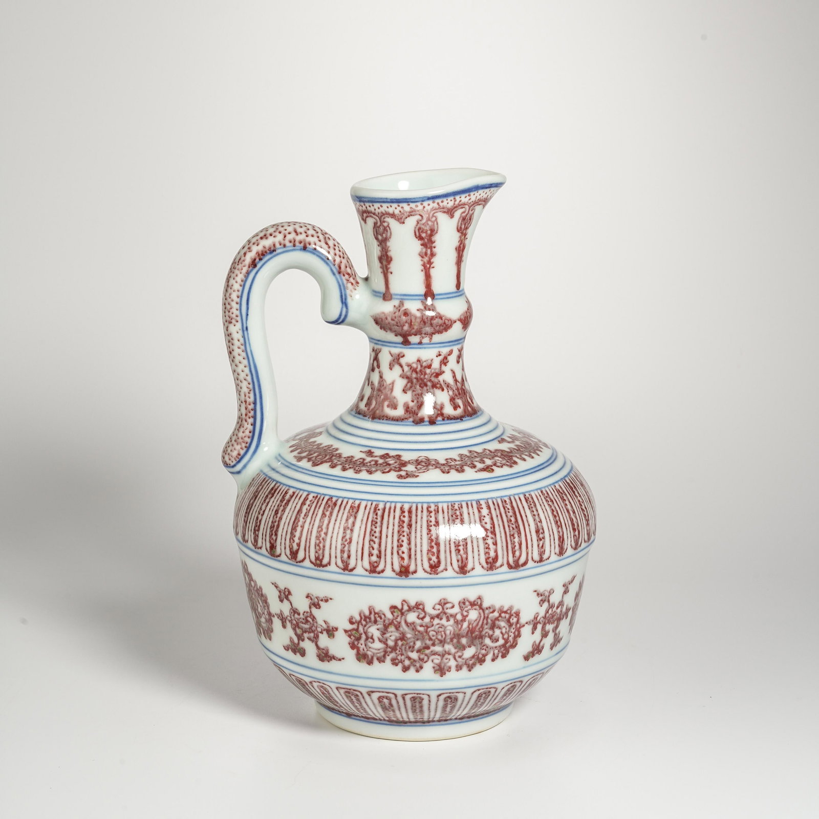 Copper-Red-Glazed Flower Ewer: Copper-Red-Glazed Flower Ewer. Length:5.12" Width:4.92" Height:7.87"