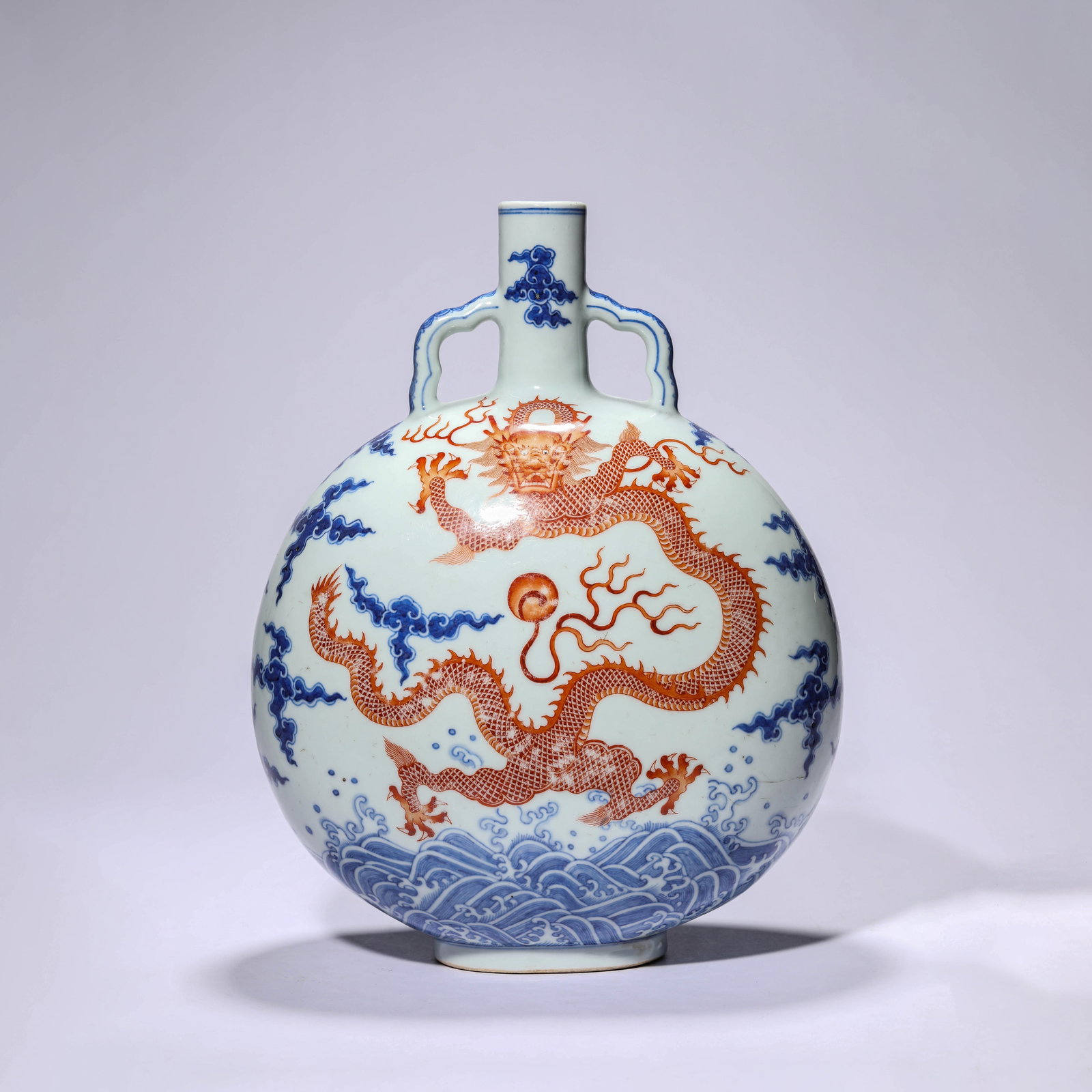 Iron-Red and Underglaze Blue Dragon Moonflask: Iron-Red and Underglaze Blue Dragon Moonflask. Length:9.72" Width:5.71" Height:9.84"
