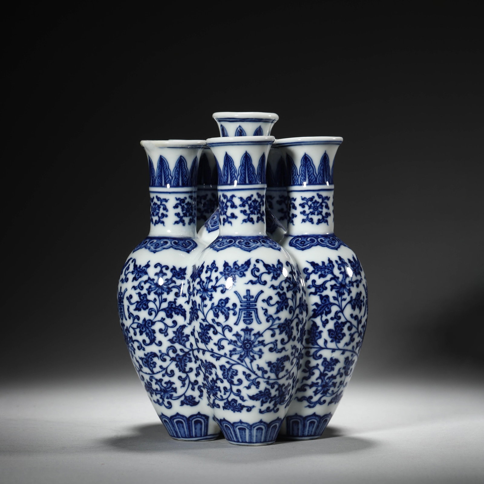 Blue and White Lotus Six-Spouts Vase: Blue and White Lotus Six-Spouts Vase. Length:5.12" Height:6.89"