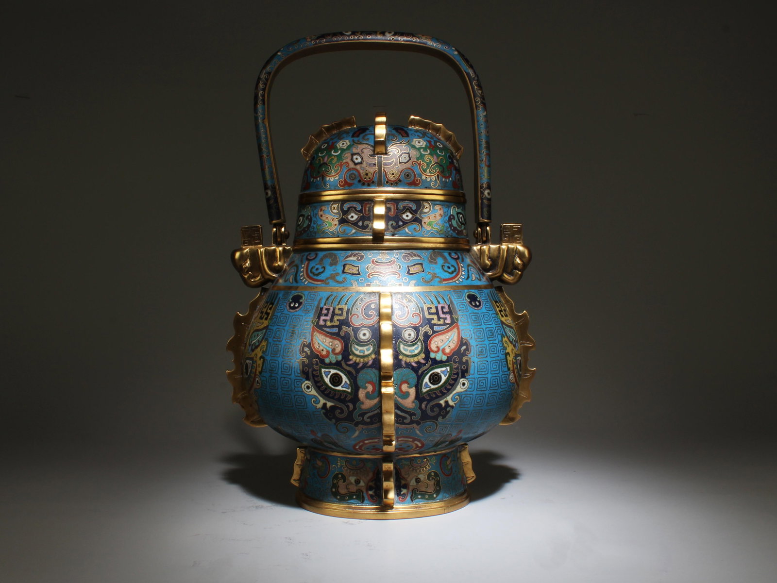 A Rare And Majestic Cloisonne Enamel Wine Vessel: A Rare And Majestic Cloisonne Enamel Wine Vessel. Dimensions: 13.5" x 8.5" x 7". Weight: 7 lbs.