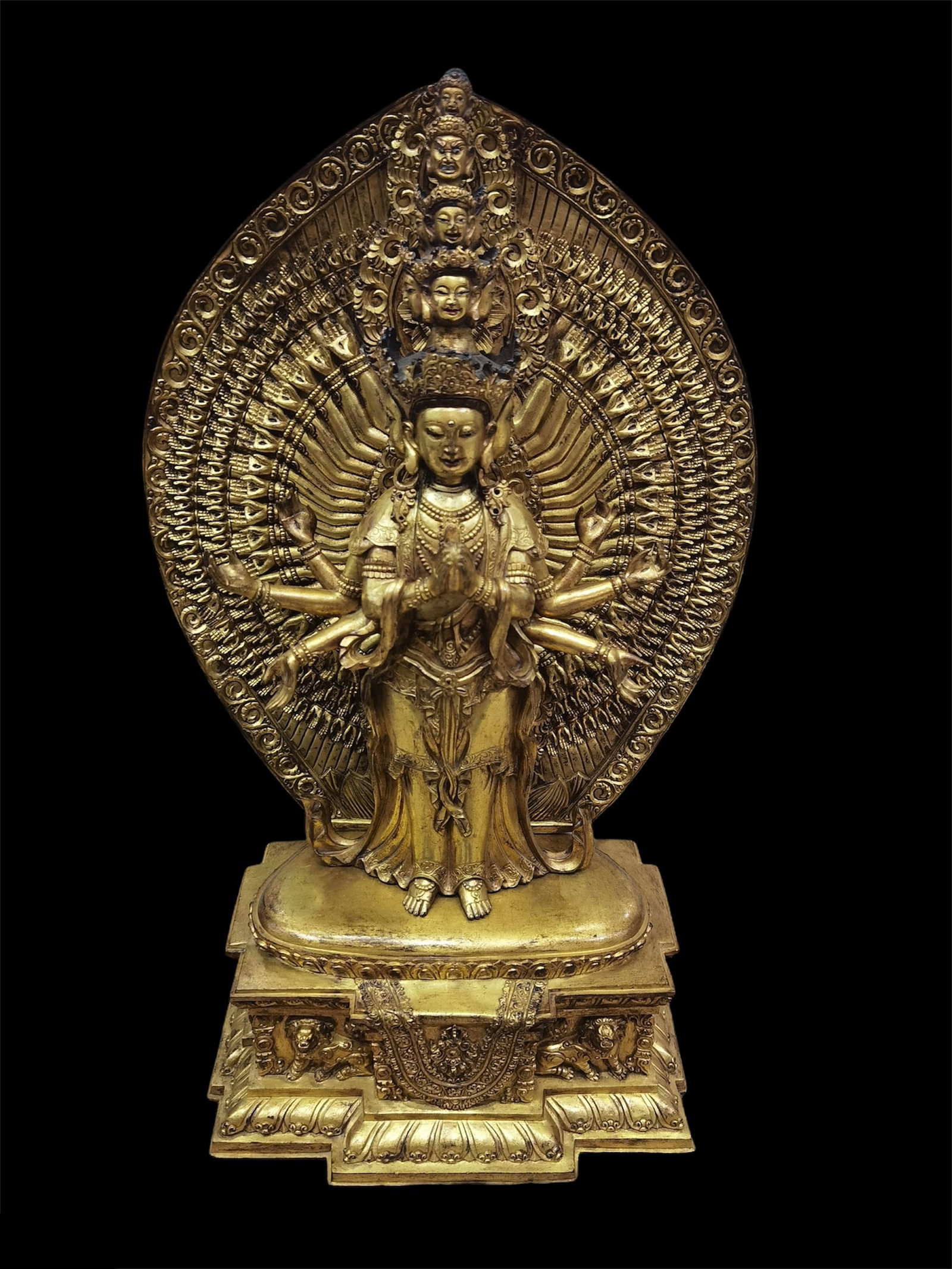A Gilt Bronze Thousand Hands Guanyin Statue: A Gilt Bronze Thousand Hands Standing Guanyin Statue. Height: 18" Provenance: From Pasadena Antique Center, California.