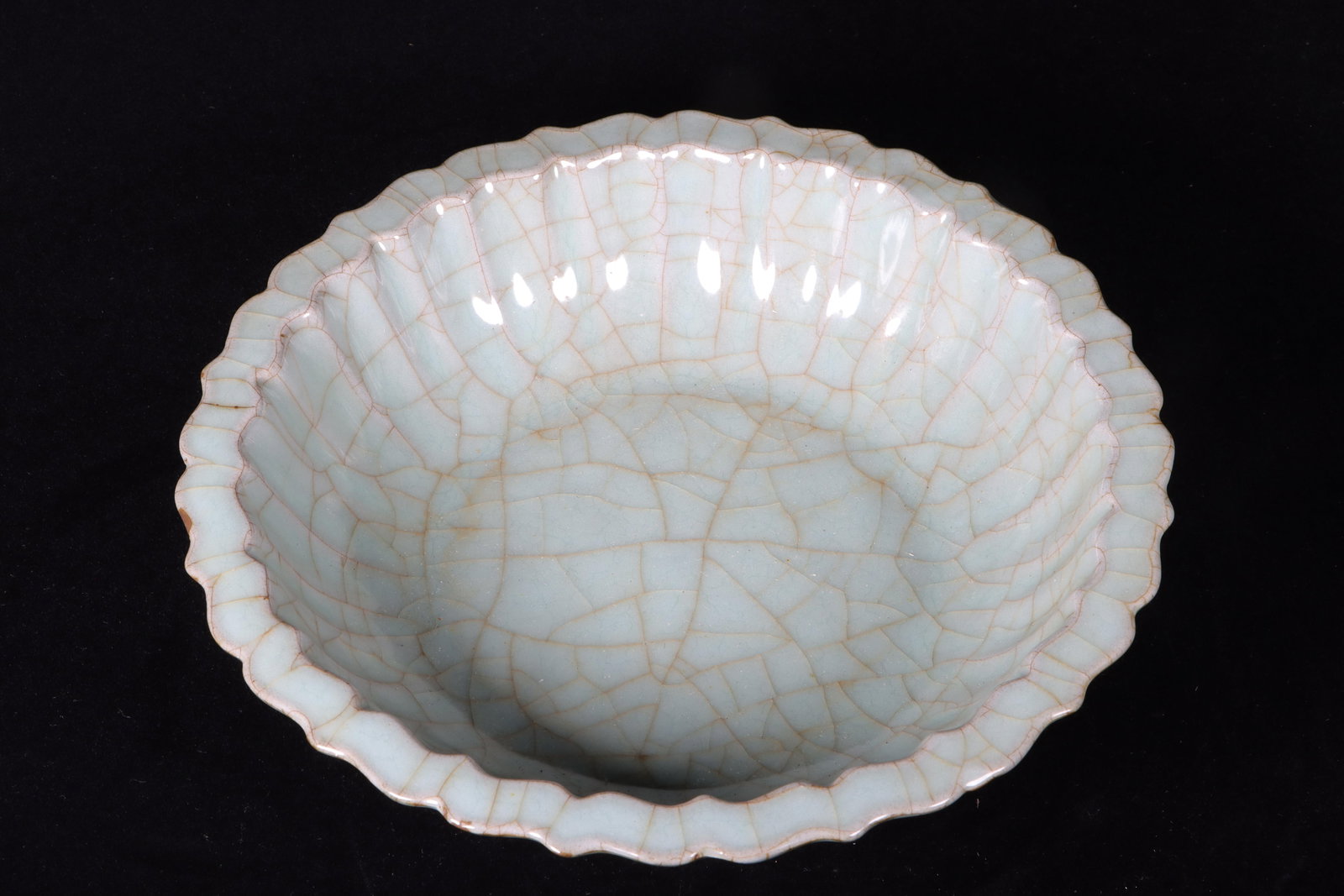 A Guanyao Ink Plate: A Guanyao Ink Plate. Dimensions: 7.6" x 2".